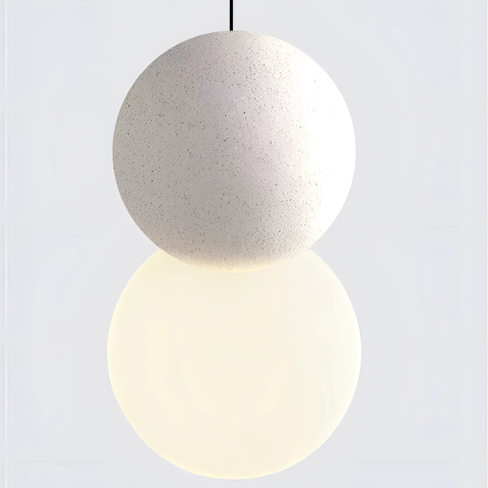 Modern minimalist LED pendant light with a black and gray spherical design, featuring a metal and wood lampshade, hanging from a ceiling fixture.