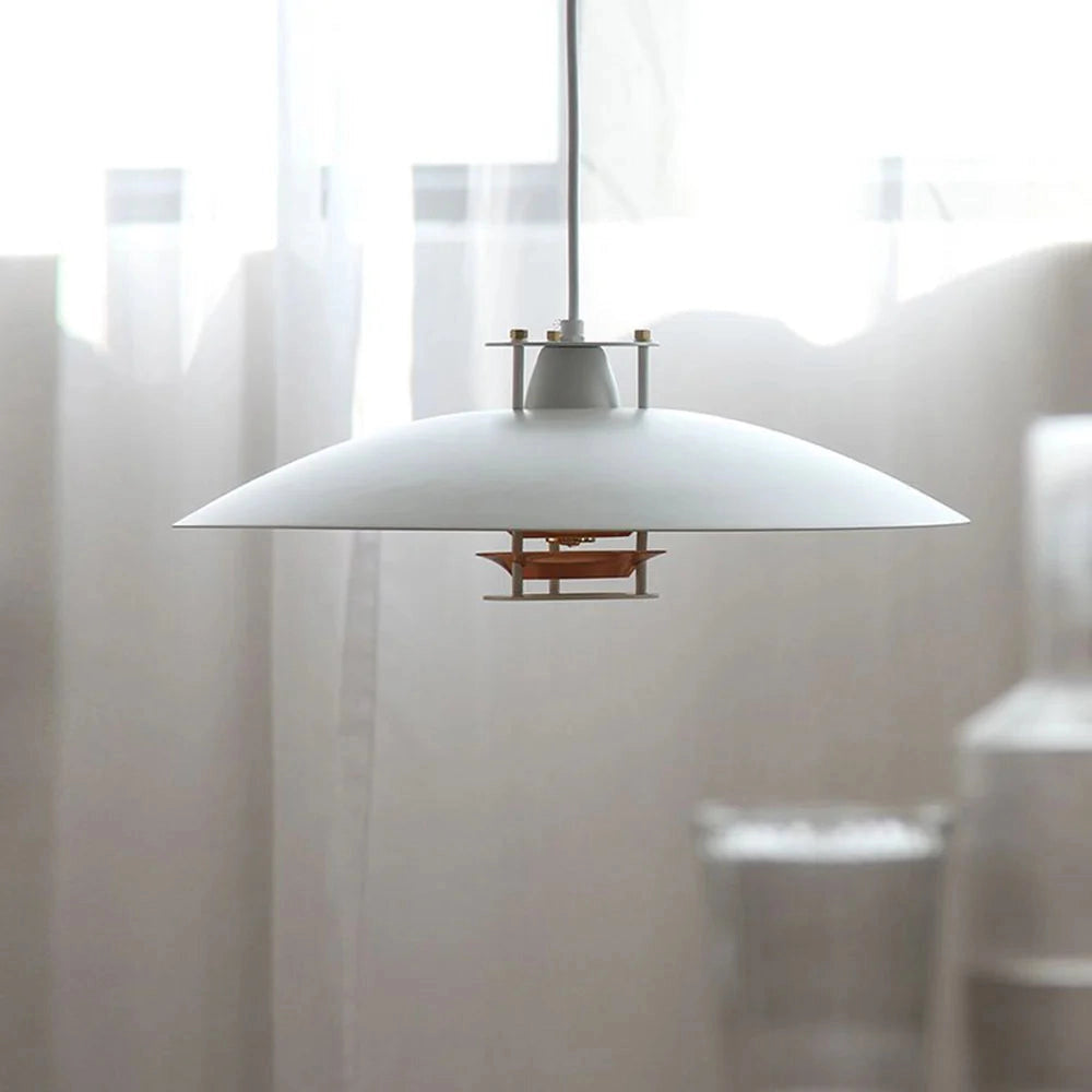 Modern minimalist LED pendant light with a Scandinavian design featuring a white and rose gold color combination, hanging from the ceiling in a stylish interior setting.