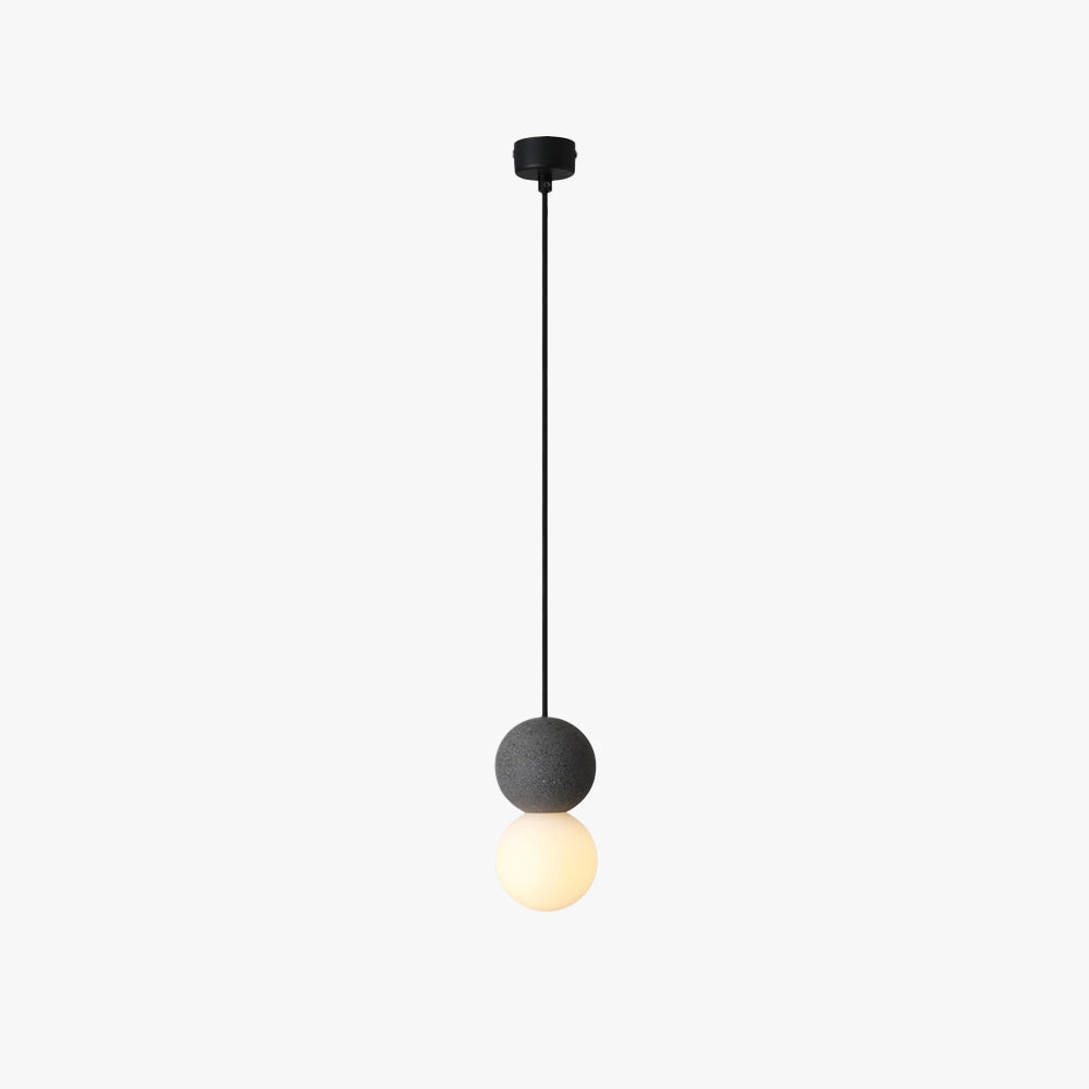 Modern minimalist LED pendant light featuring a spherical design in black and gray, elegantly suspended from the ceiling as a stylish and contemporary ceiling fixture.