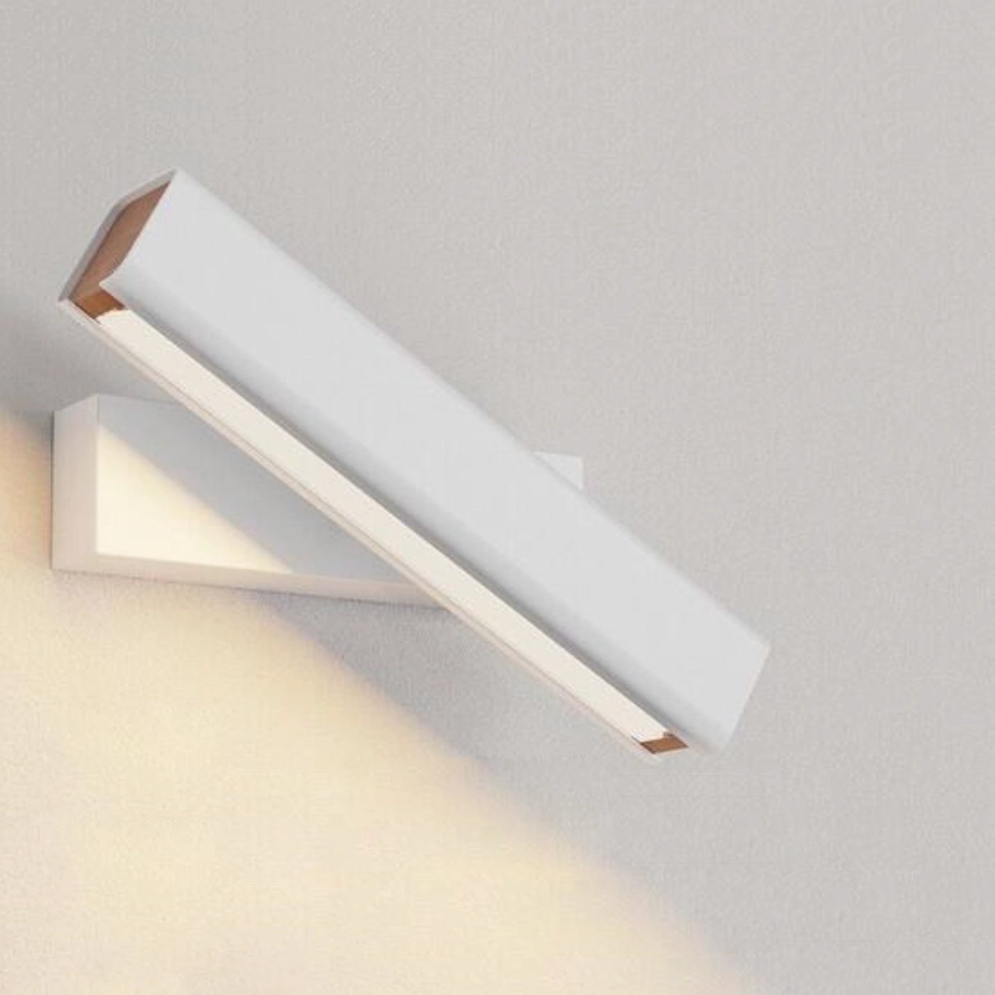 Modern minimalist LED wall sconce featuring a sleek angular design with a combination of metal and wood materials, ideal for contemporary interior design.