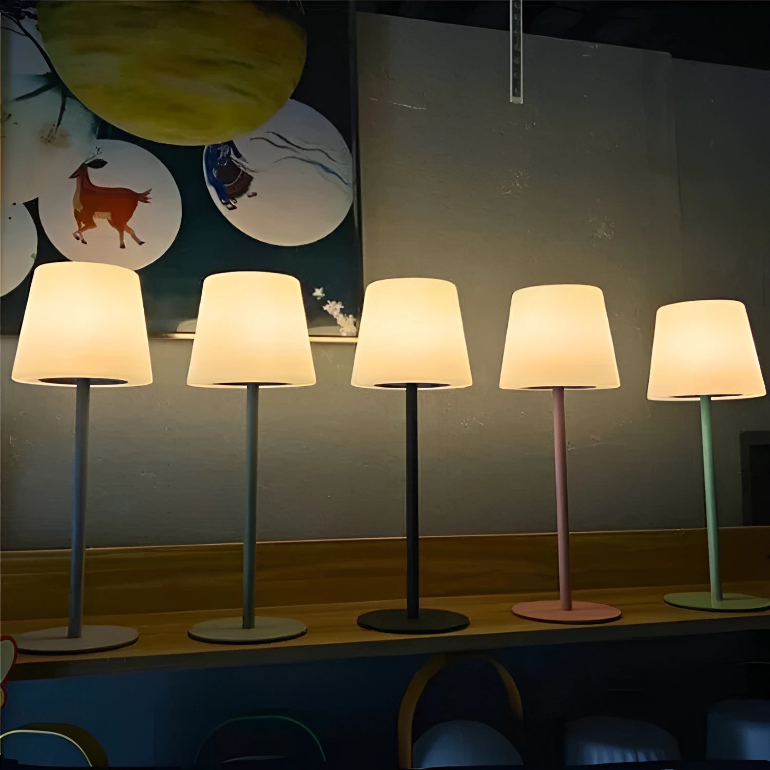 Modern minimalist pastel table lamp featuring a sleek wooden base and a soft pastel lampshade, designed to add chic lighting to living rooms and bedrooms.