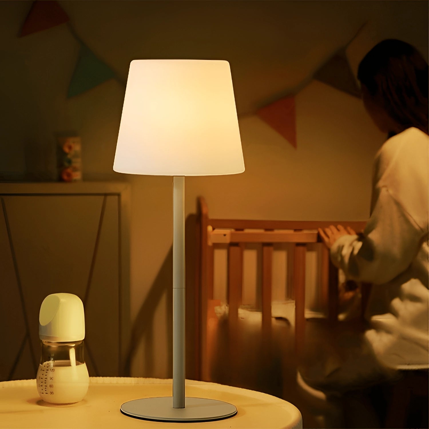 A modern minimalist table lamp with a pastel yellow shade and wooden base, ideal for chic living room or bedroom decor.