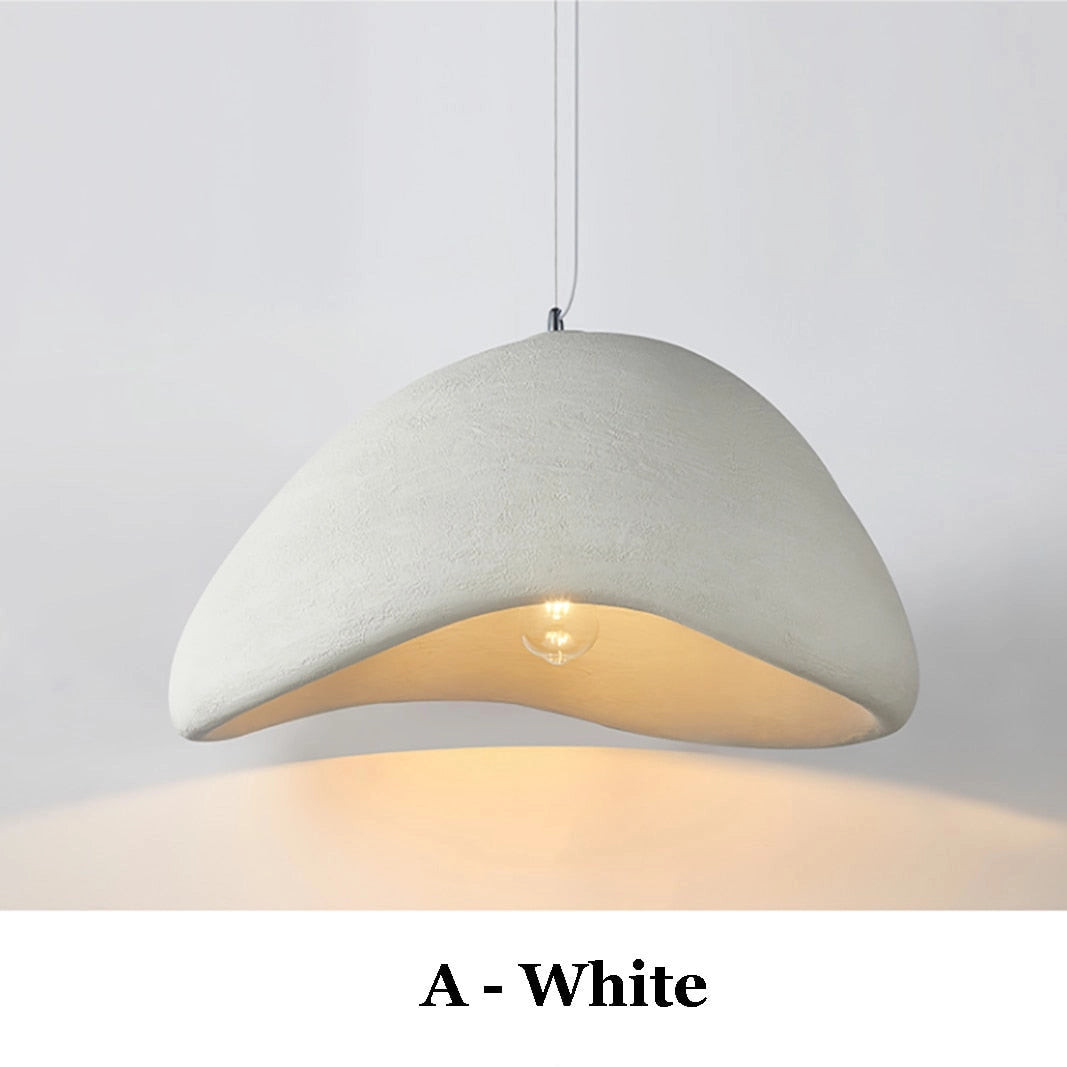 Modern minimalist Scandinavian pendant light fixture in white with a cylindrical shape, featuring warm white illumination; suitable for kitchen ceiling installation.