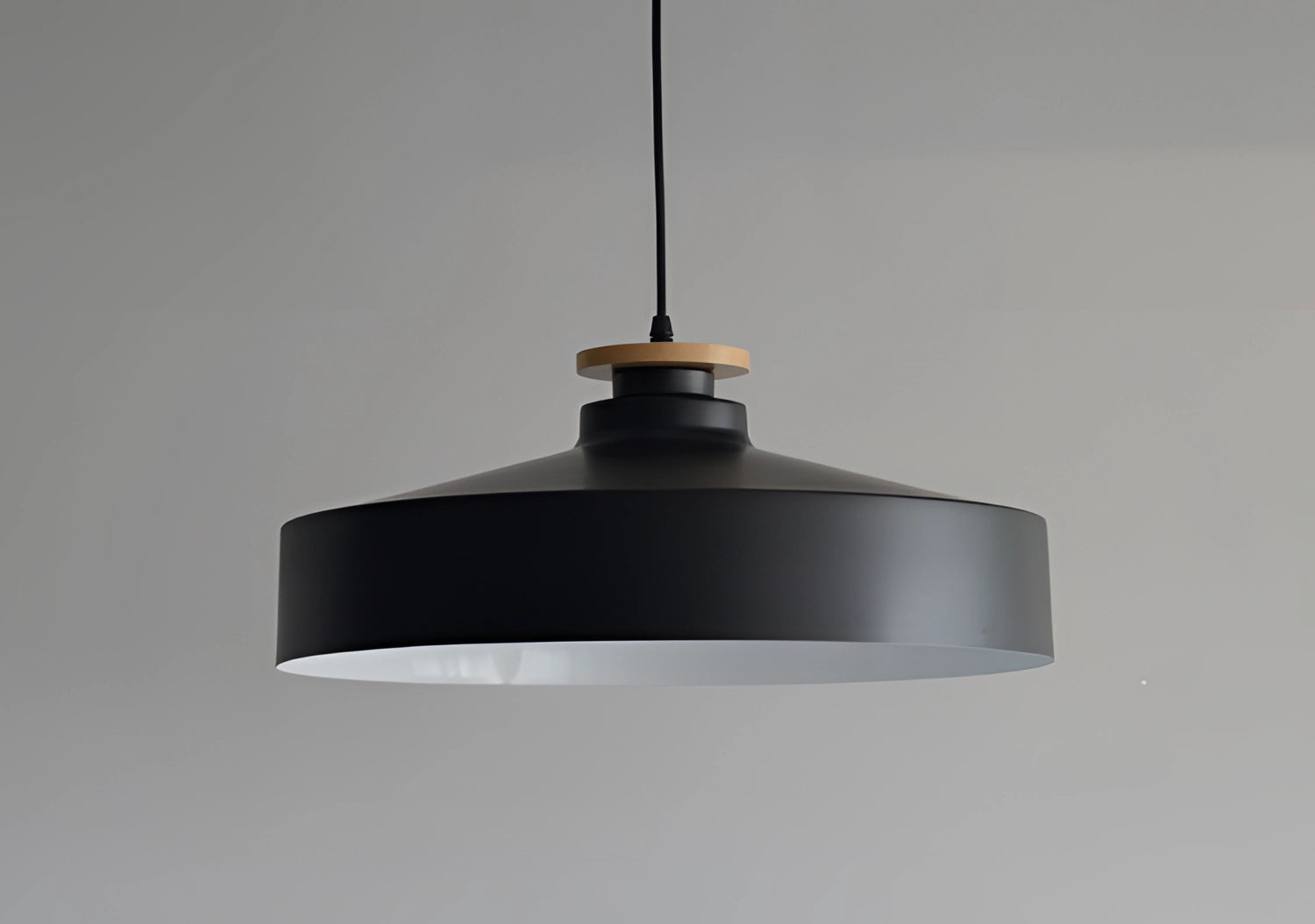 Modern minimalist black and white Scandinavian design pendant lights featuring cylindrical metal shades in aluminum.