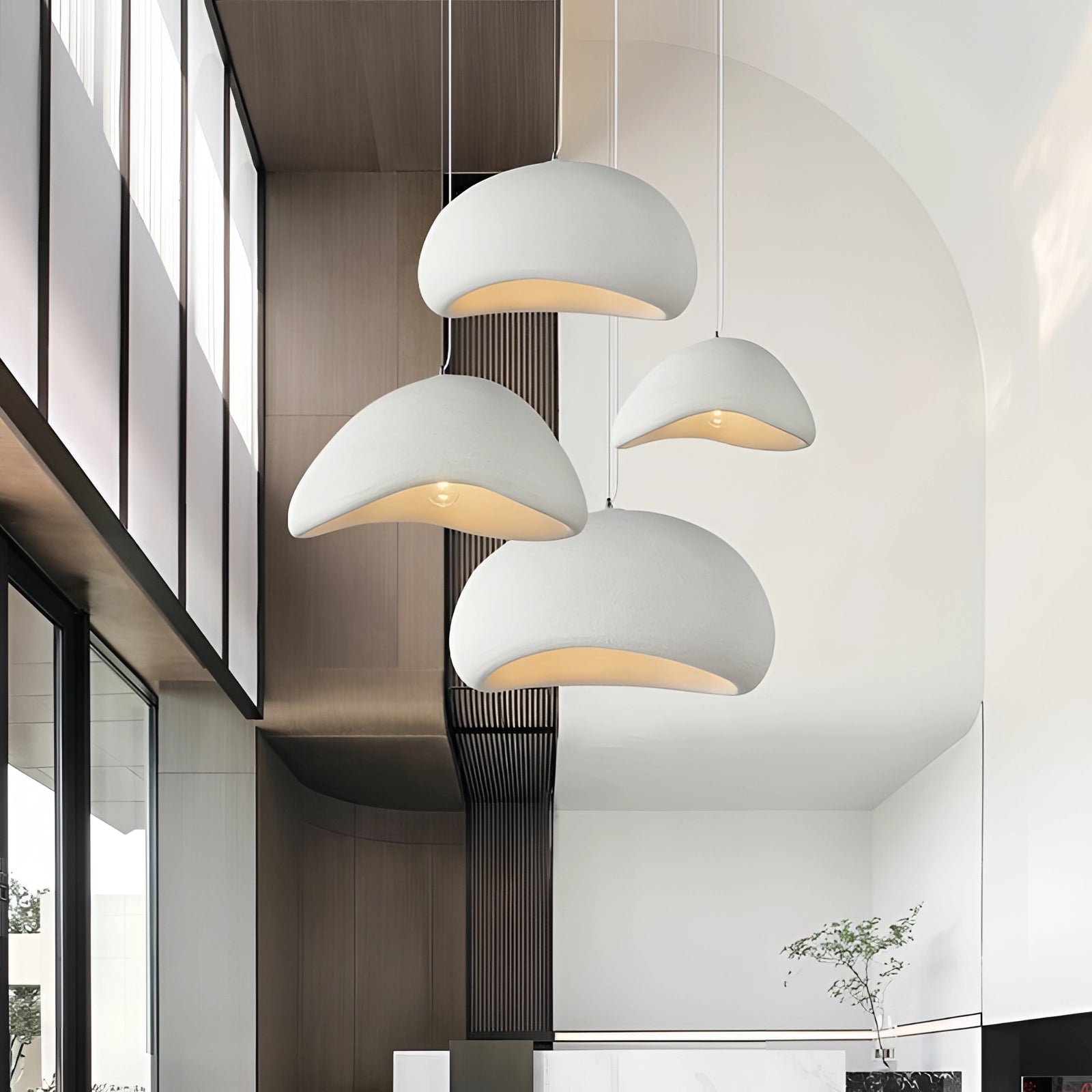 Modern minimalist pendant light with a sleek Scandinavian design hanging in a contemporary kitchen setting, showcasing its elegant shade and efficient lighting against a stylish interior backdrop.