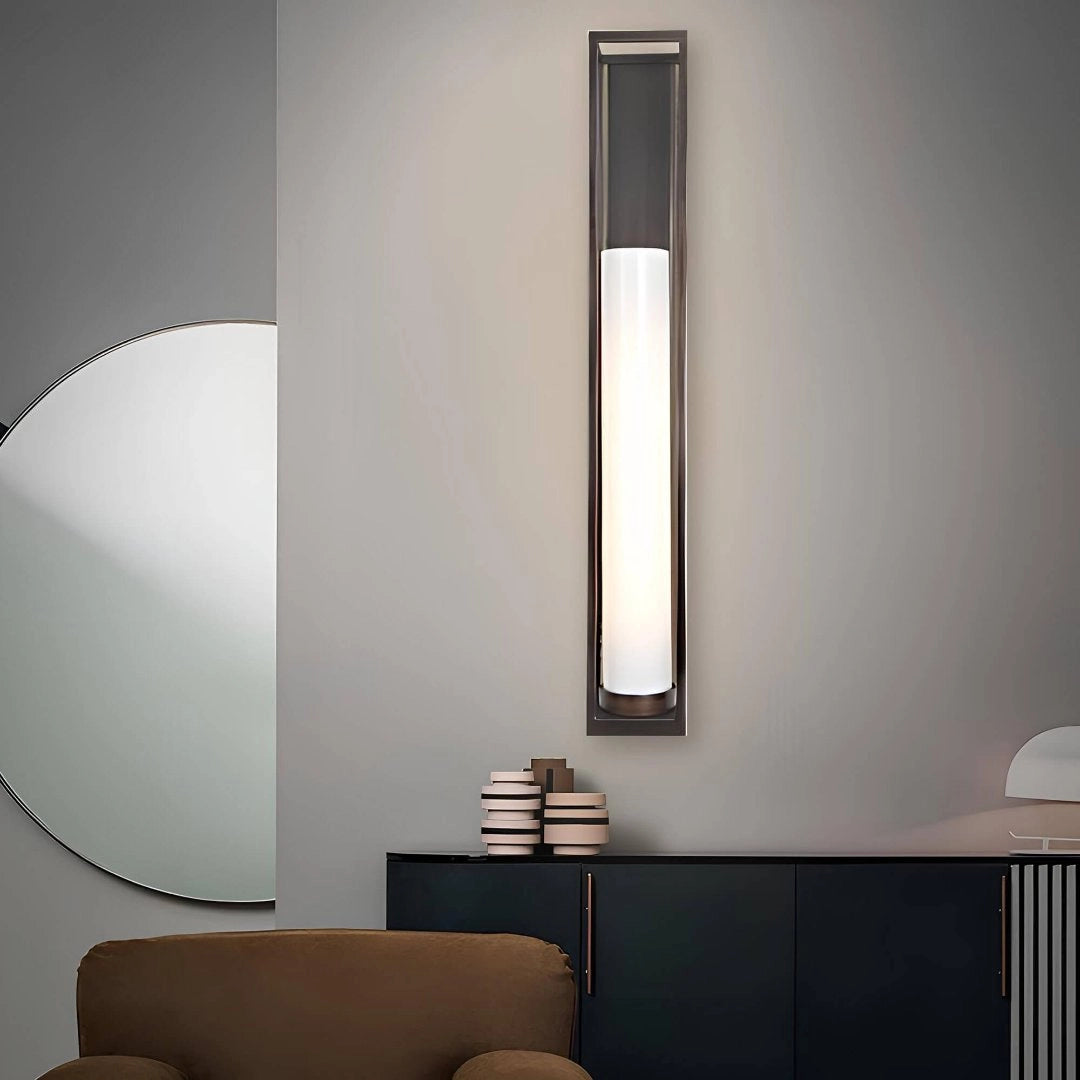Wall-mounted LED light fixture with a modern minimalist design, featuring a rectangular shade in a grey finish; ideal for contemporary interior architecture.