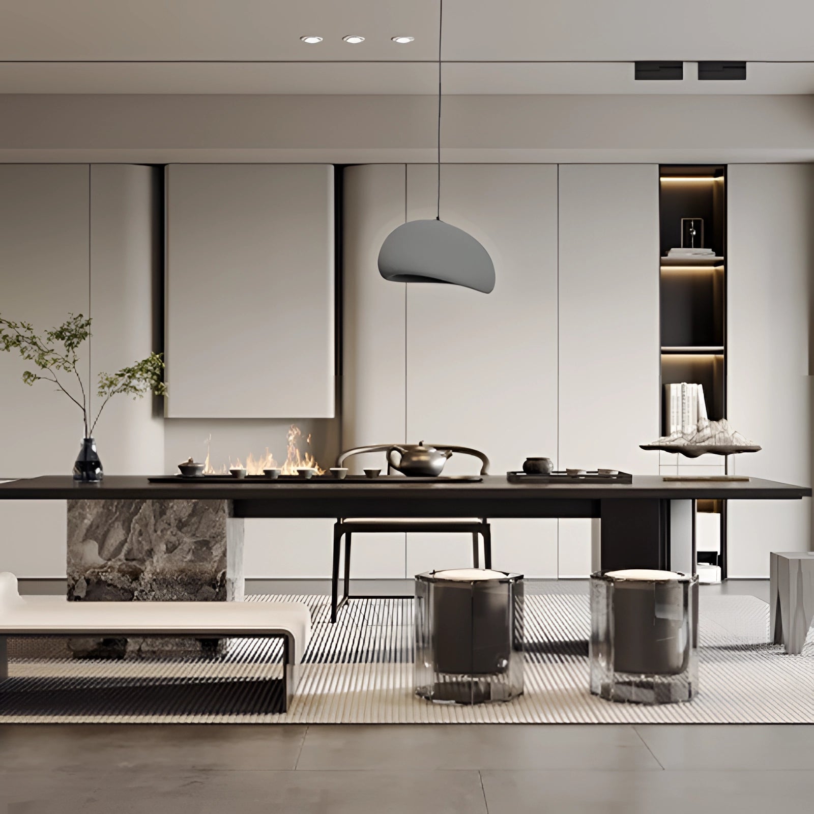 Modern minimalist white dome pendant light with a gray finish, hanging above a kitchen area featuring contemporary cabinetry, a sleek countertop, and a kitchen stove, enhancing the elegant decor with its subtle yet sophisticated design.