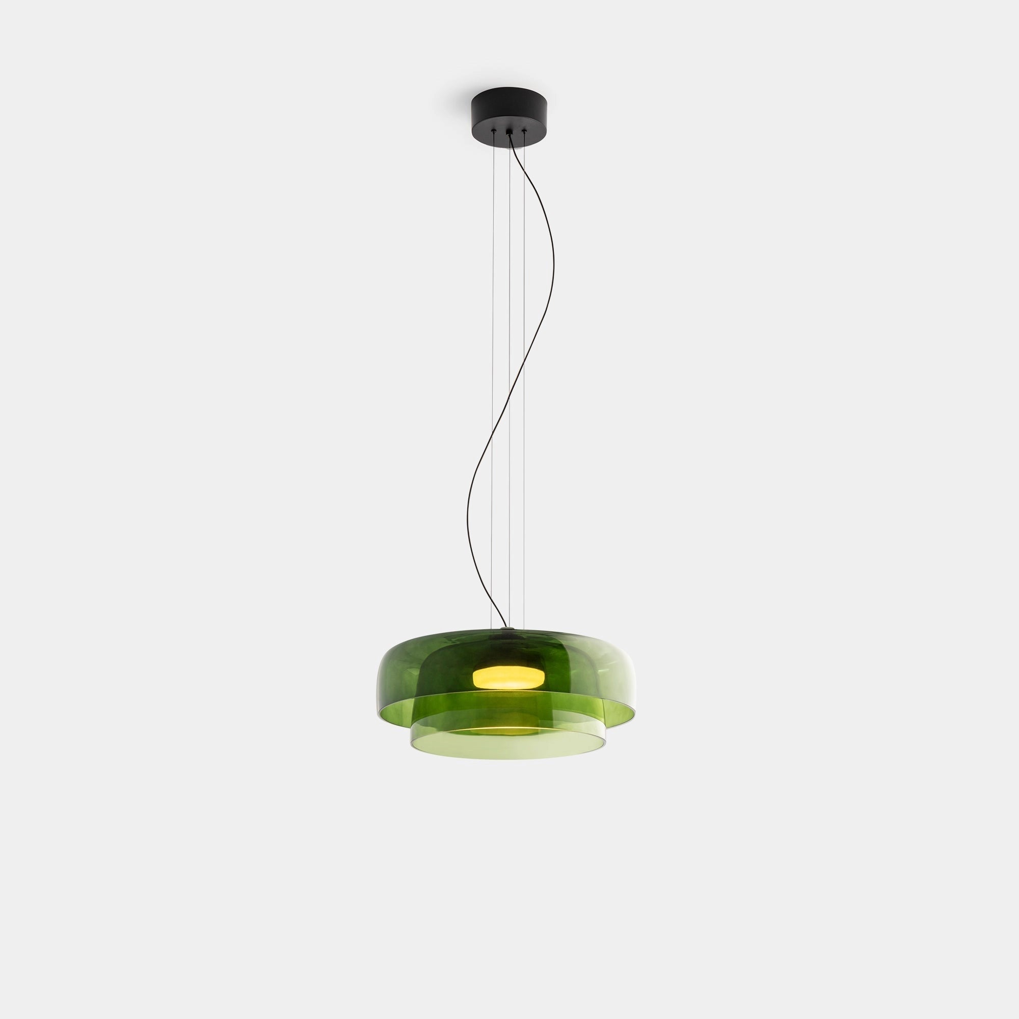 Modern multi-colored glass pendant light with a contemporary design, featuring a sleek, artistic glass shade and elegant fixture.