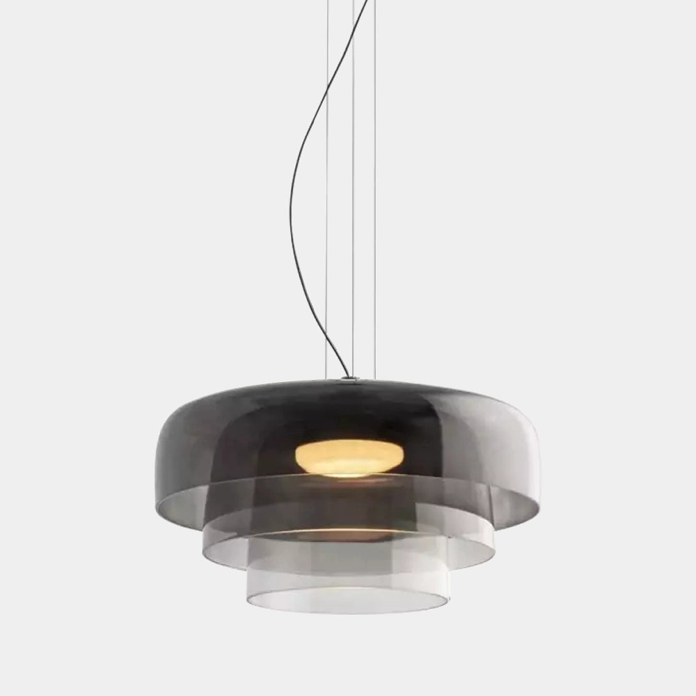 Modern multi-colored glass pendant light with gray hues, featuring a contemporary design and a 3-tiered structure; dimensions 42cm in diameter and 26cm in height, hanging from the ceiling.