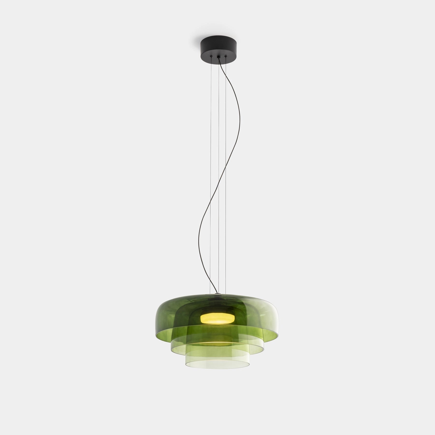 Modern multi-colored glass pendant light with contemporary design, hanging from the ceiling.