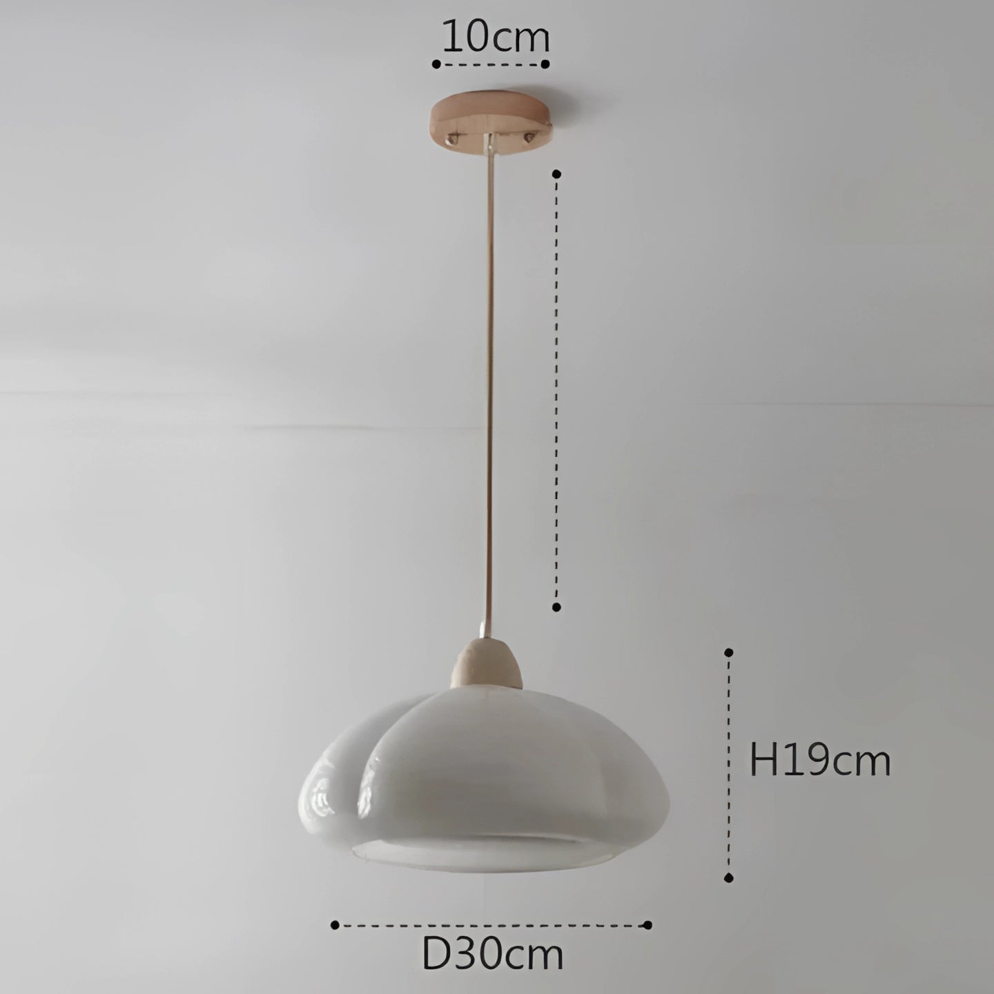 Modern orange pendant lamp with a sleek metal design, suspended from the ceiling. The lamp is available in white and warm white colors, providing stylish and functional lighting for home offices and kitchens.