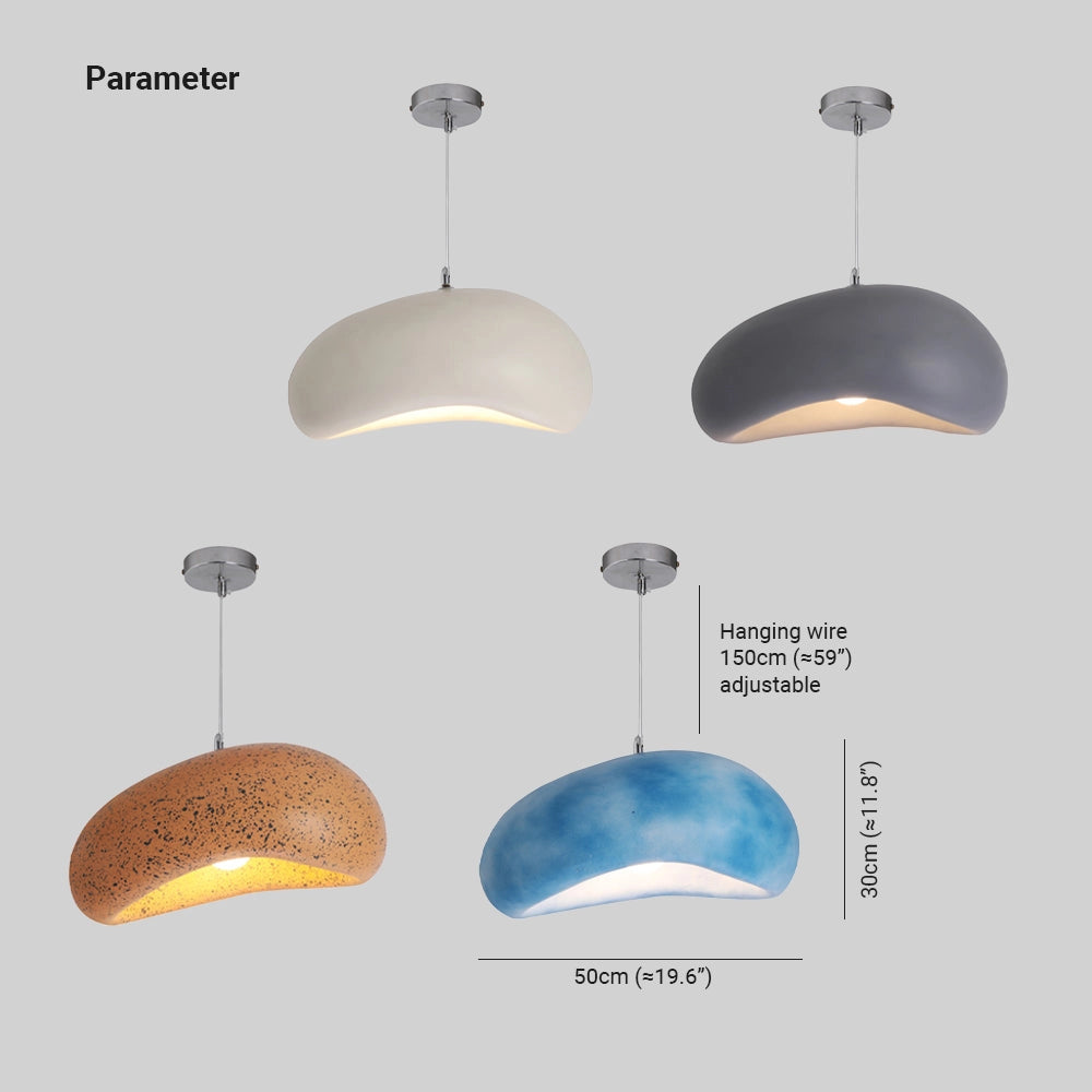 Modern oversized white pendant light fixture with a minimalist design, installed on a ceiling over a dining table. The fixture features a smooth, circular shape and a clean, contemporary aesthetic.