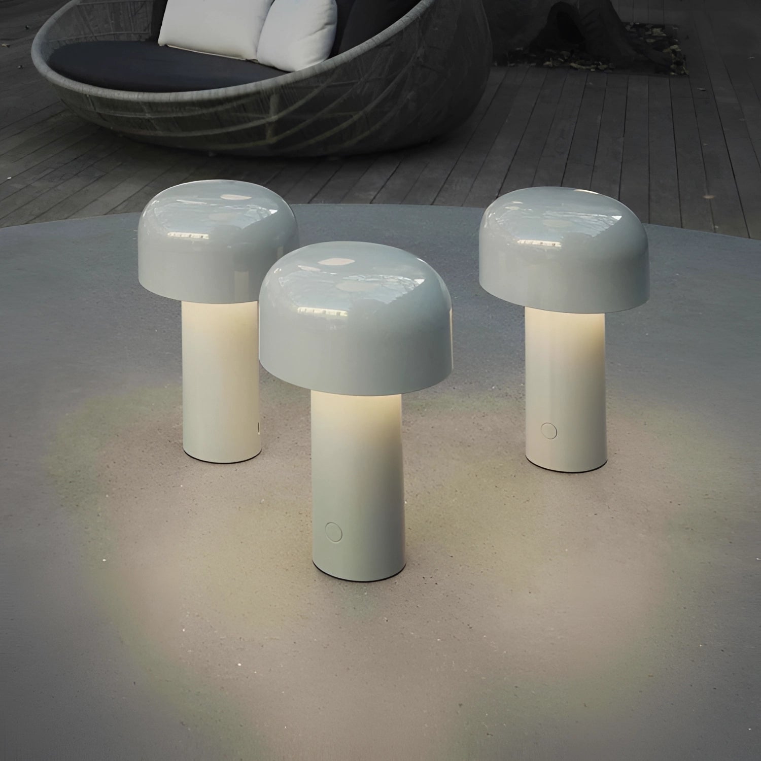 Modern portable wireless LED lamp with a sleek cylindrical design, featuring touch controls. The lamp is made from durable composite materials, including plastic and aluminum, with a contemporary metallic finish.
