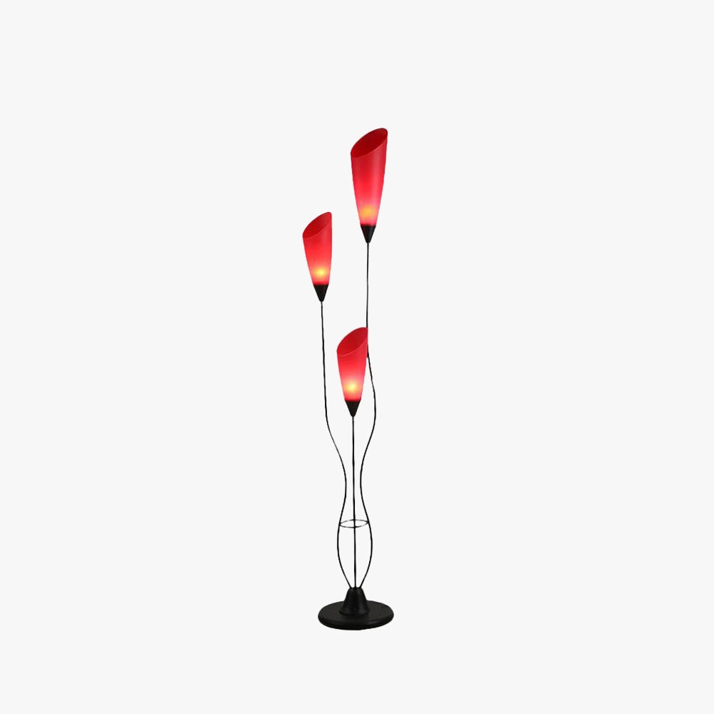 Modern red sculptural floor lamp with an elegant abstract design featuring fluid, artistic lines. The lamp is in a rich carmine hue, resembling a piece of art, and can be used as a fashionable decor element in contemporary interiors.