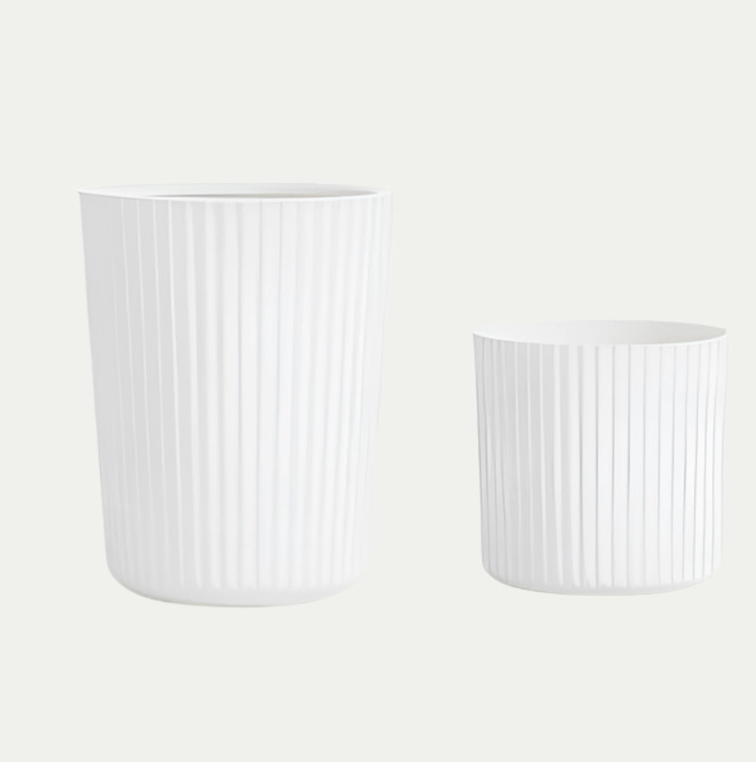 White large modern ribbed ceramic planter with a Scandinavian design, featuring a cylindrical shape and smooth finish.