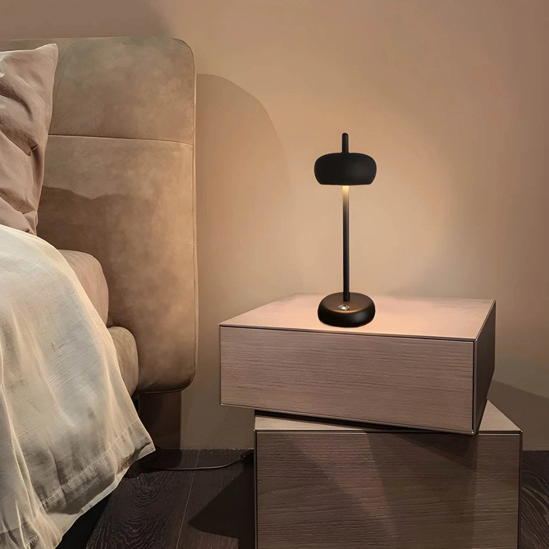 Modern Scandi white floor lamp with an adjustable shade, featuring a minimalist design, wooden base, and sleek rectangular shape, placed in a cozy room setting.