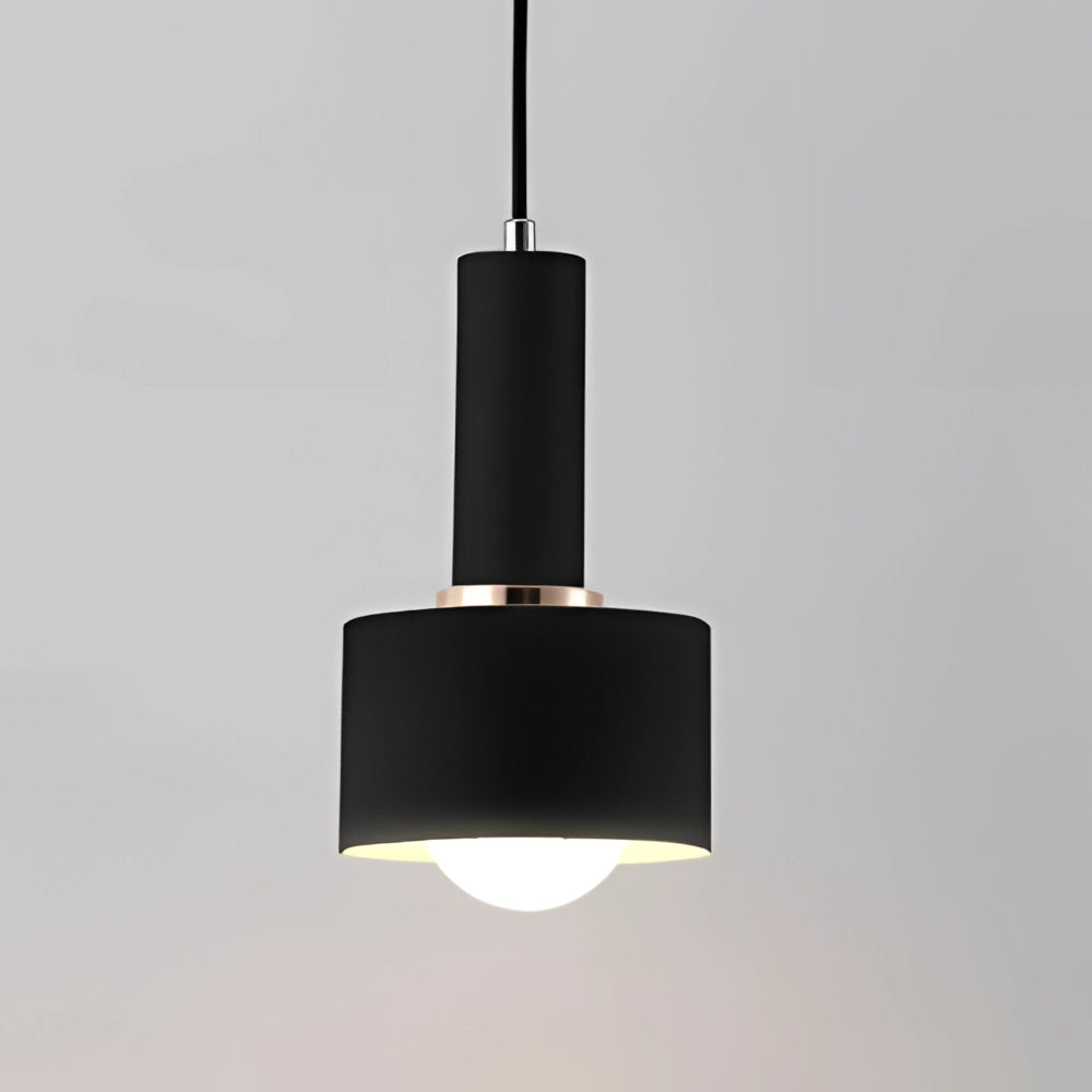Modern Scandinavian Cylinder Pendant Light in Black, minimalist geometric design, hanging from the ceiling.