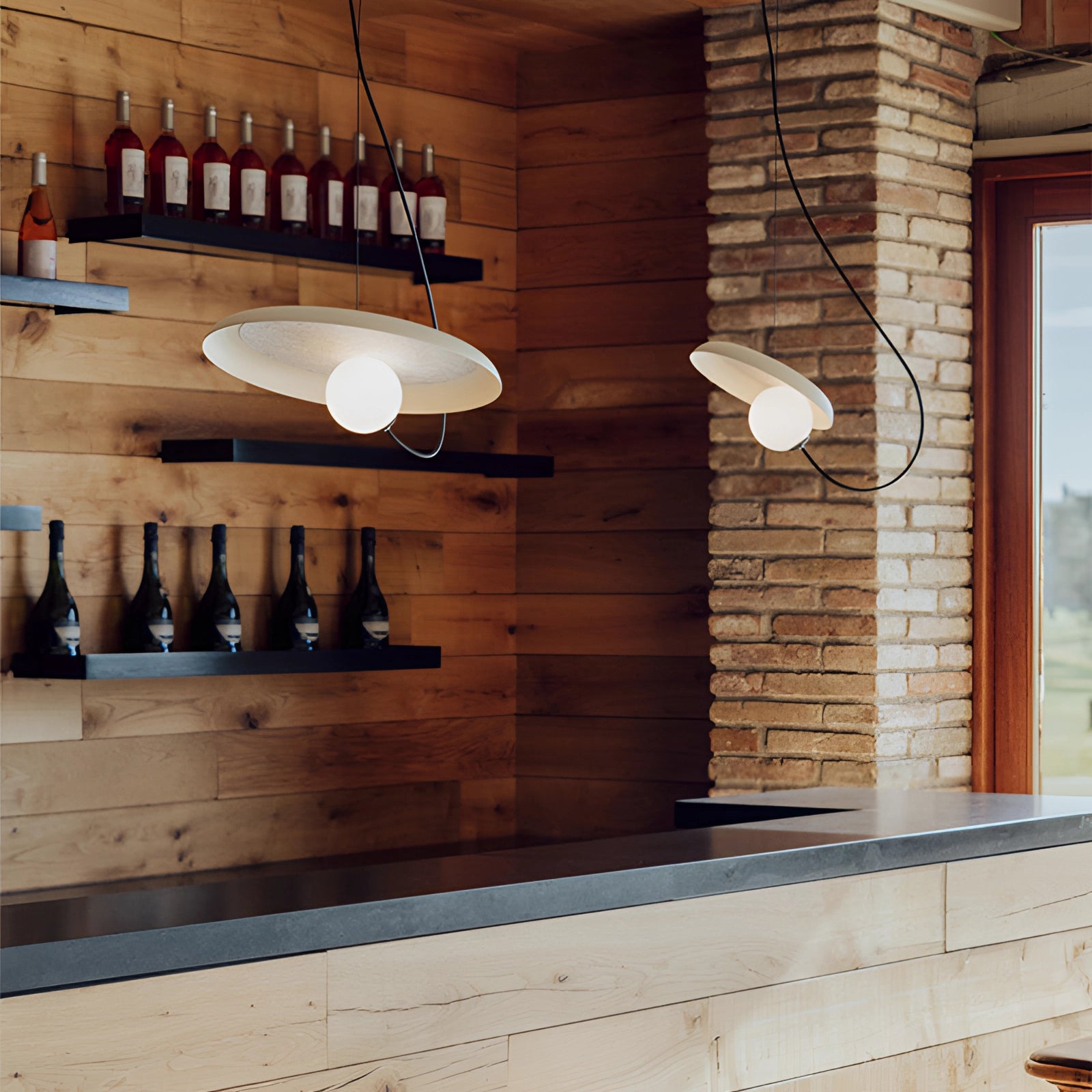 Modern Scandinavian pendant light with a 13.8-inch white shade and minimalist wood accent, elegantly hanging in a stylish interior setting.