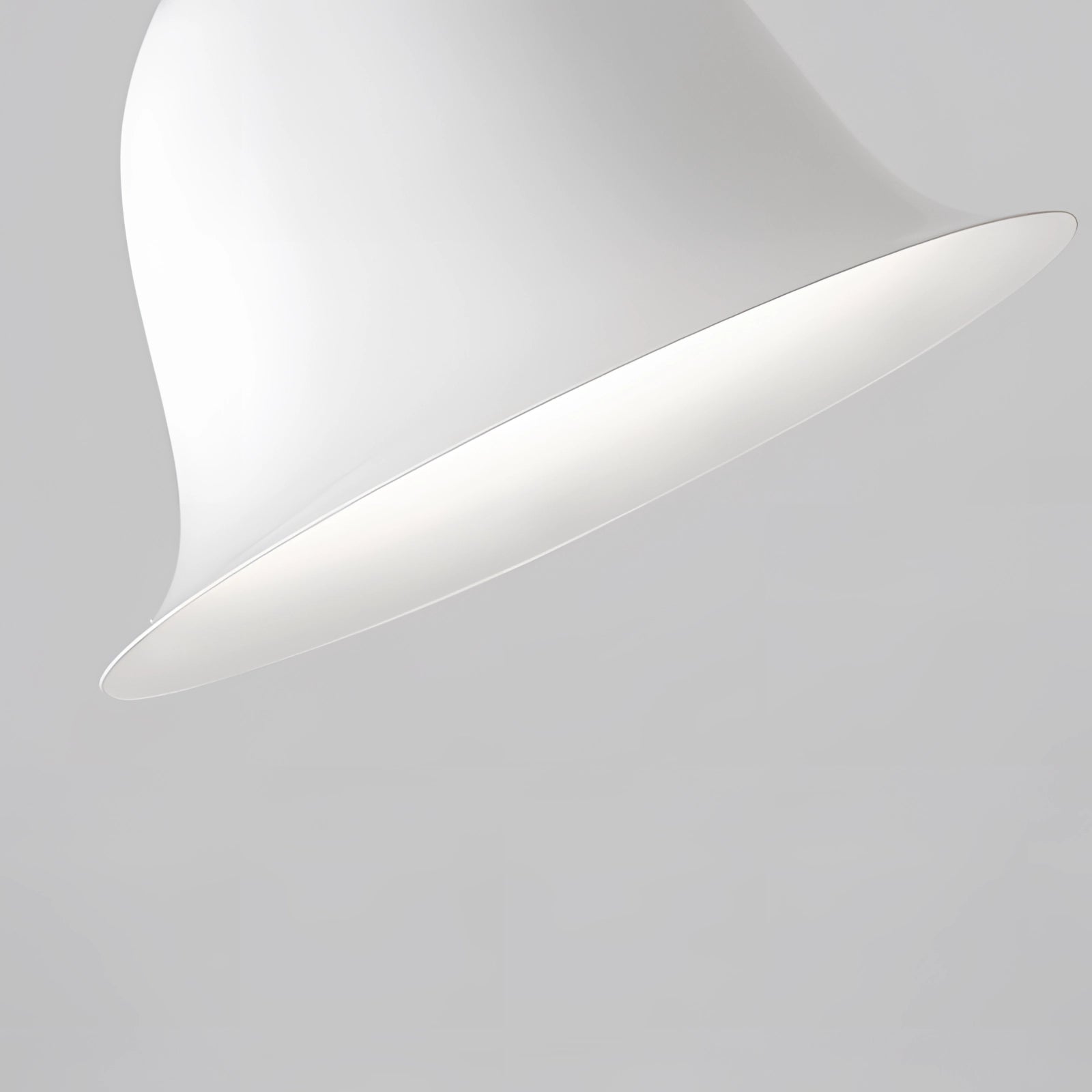 Modern Scandinavian white LED pendant light with a minimalist design, featuring a circular metal structure suspended from the ceiling, resembling overlapping petals, ideal for adding an elegant touch to a contemporary living space.