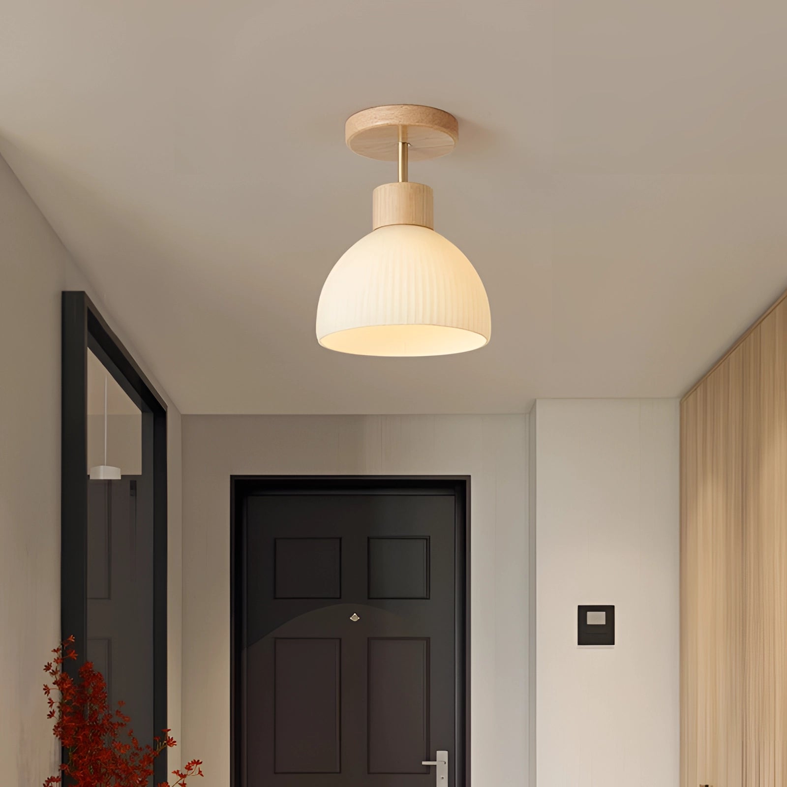 Modern Scandinavian wooden pendant light featuring ribbed glass, integrated into a stylish interior design setting. The light fixture showcases natural wood elements and textured glass, complementing the contemporary décor.
