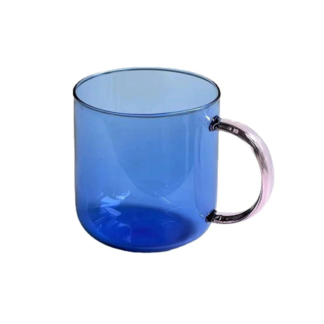 Modern smoke glass mug in a stylish grey color with a blue tint, made from borosilicate material, holding 300ml of liquid, blending design elements of both teacup and coffee cup.