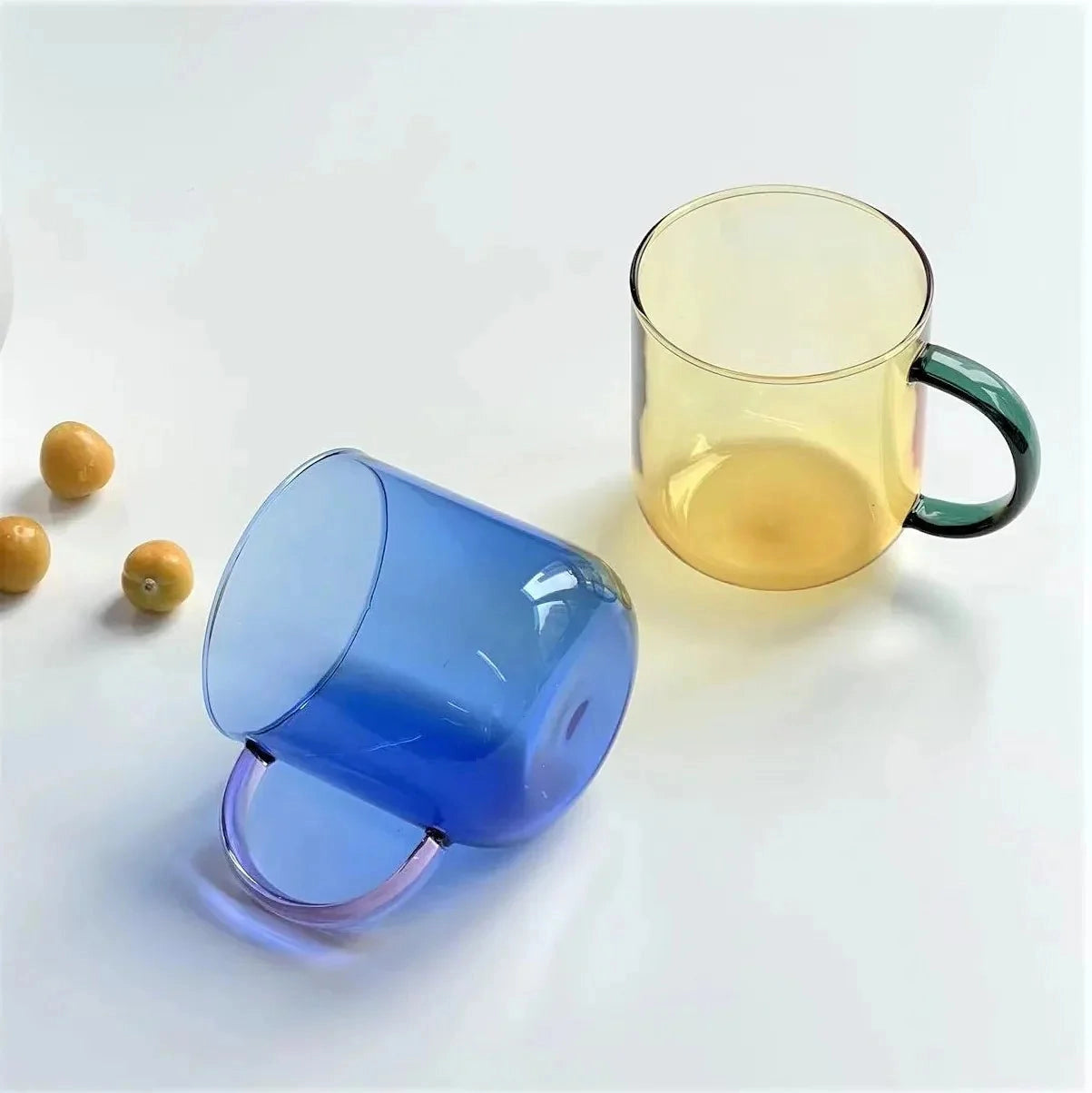 Stylish grey borosilicate glass teacup with a modern smoke design, ideal for serving hot or cold beverages.