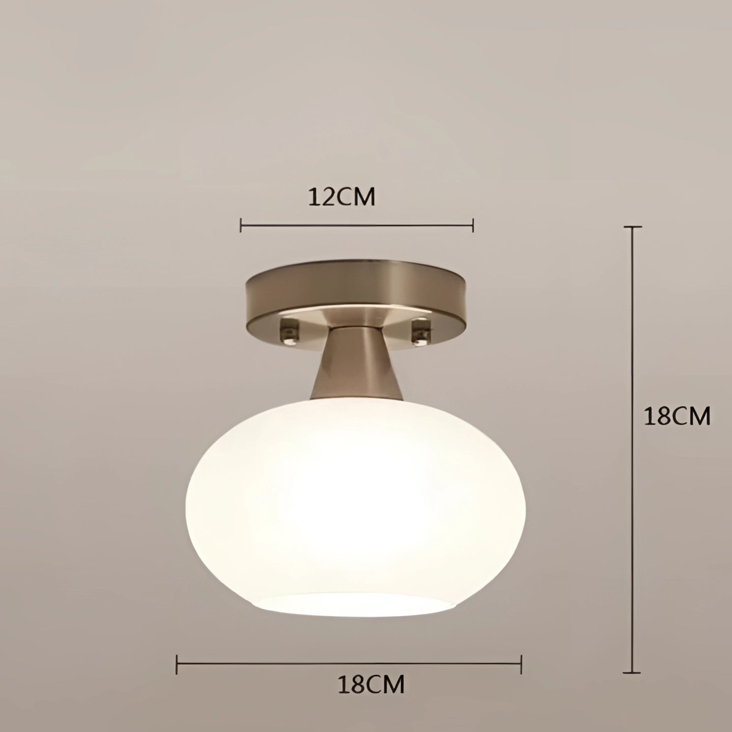 Modern spherical ceiling light with a brass socket and flush mount fixture, featuring a sleek black finish and a three-color lighting option.