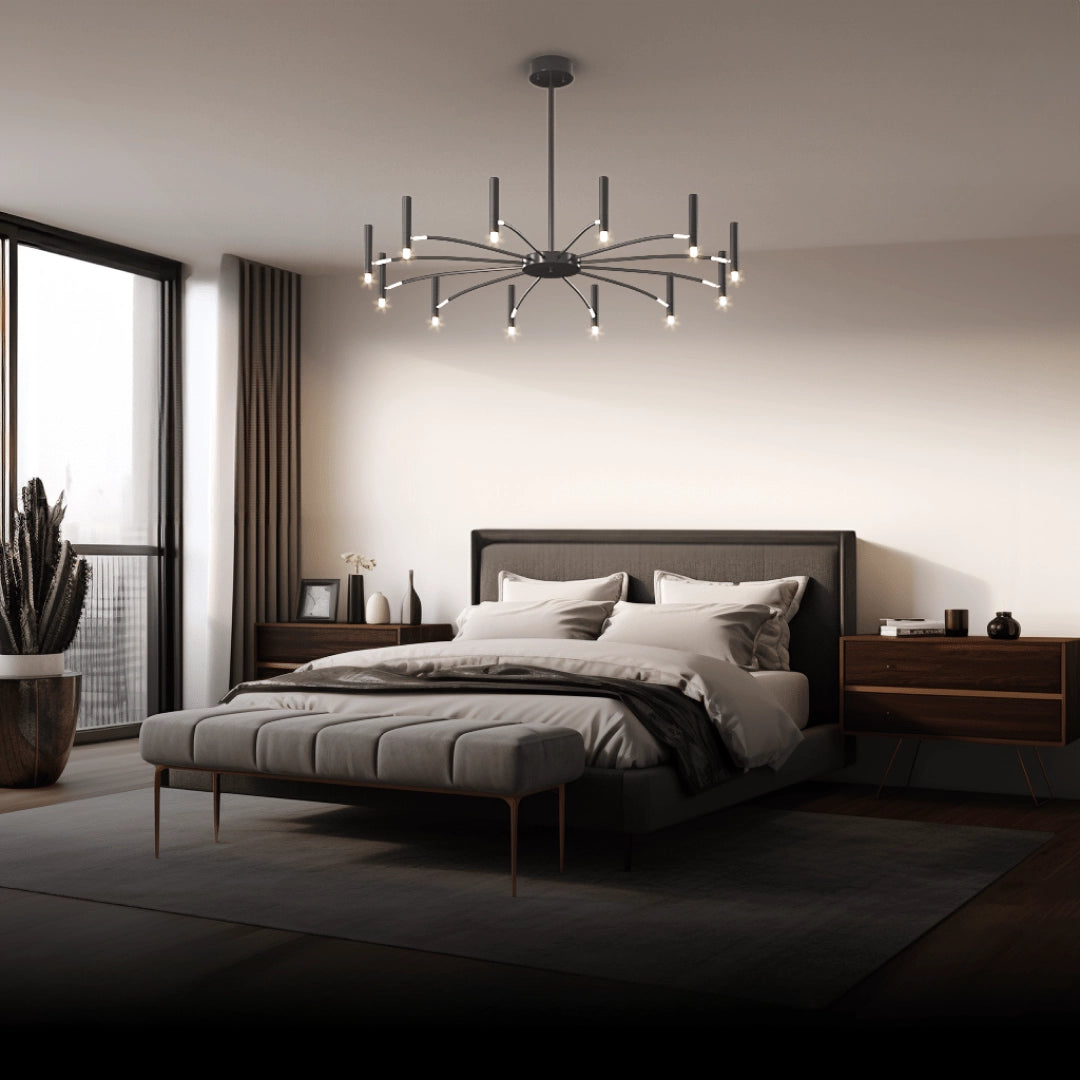 Luxurious modern starburst chandelier with 12 candle-like lights in cold white, set in a minimalist interior decor.