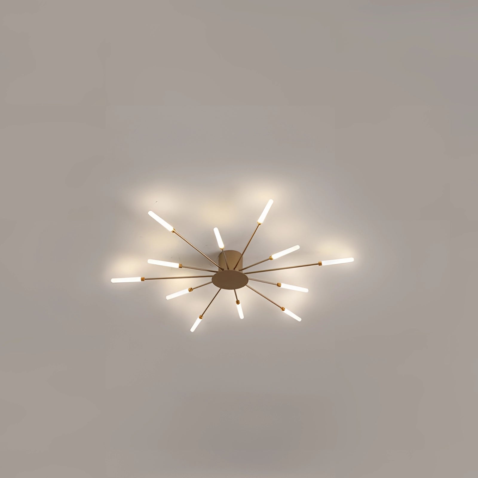 Modern Starburst LED Chandelier in Luxury Black & White with Gold accents, 12-light configuration, installed on a ceiling.