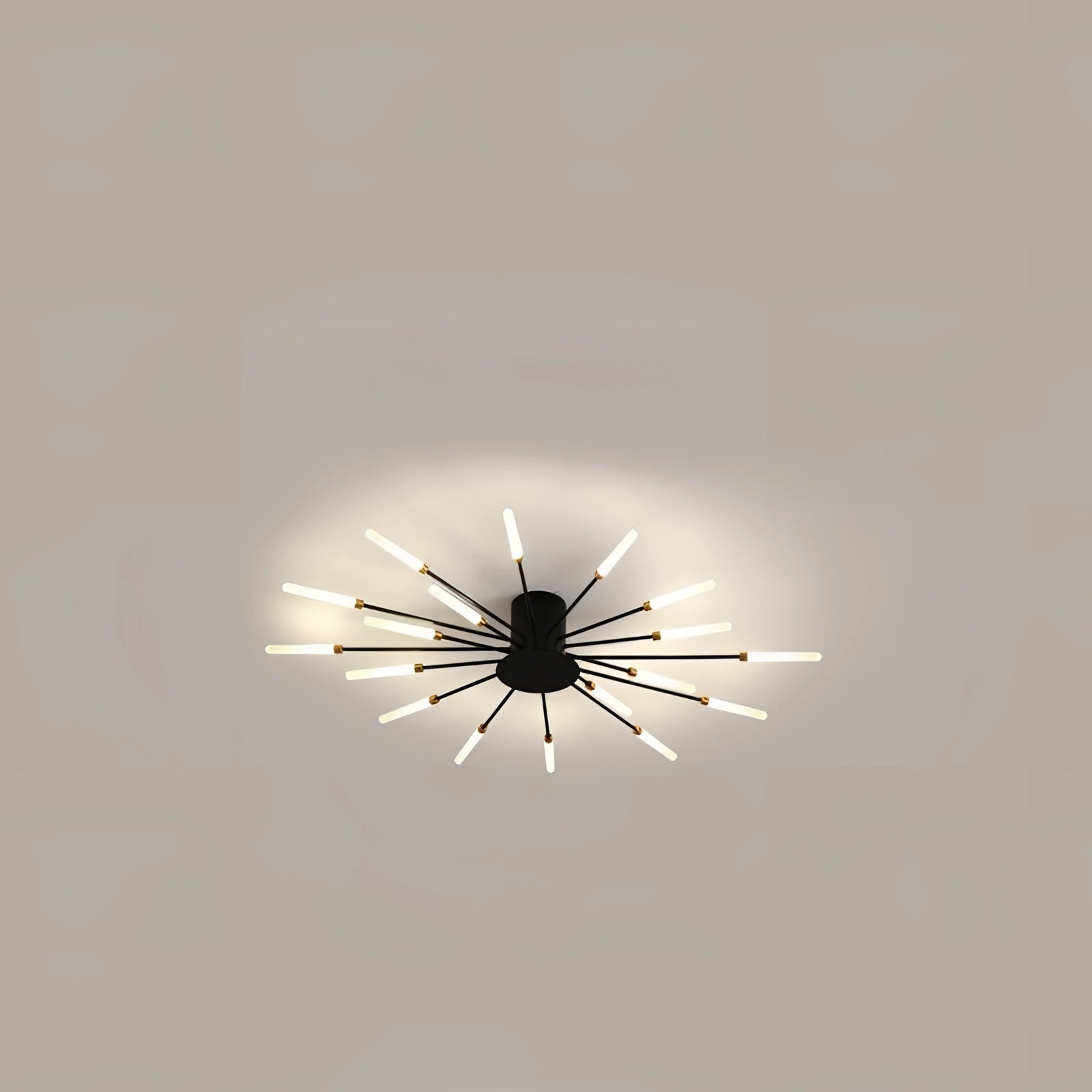 Modern Starburst LED Chandelier in black with 18 arms, featuring a sleek black and white design, hanging from the ceiling.