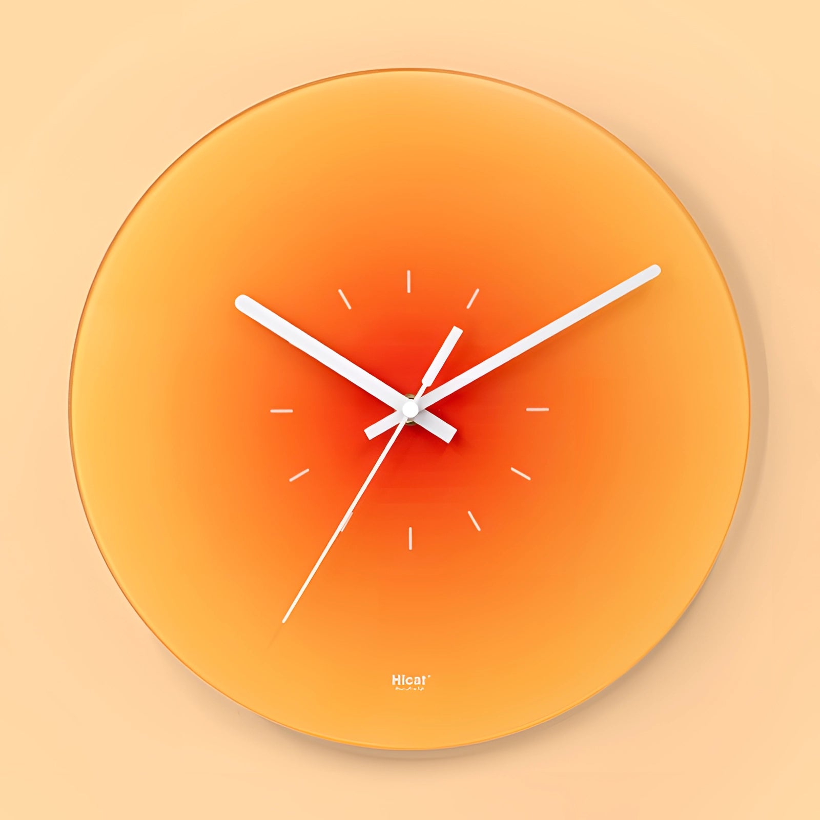 Modern wall clock with a minimalist design, featuring a gradient of sunset orange hues. The clock has a circular shape with a clear, simple font for the numbers, ideal as a stylish decor piece for interiors.