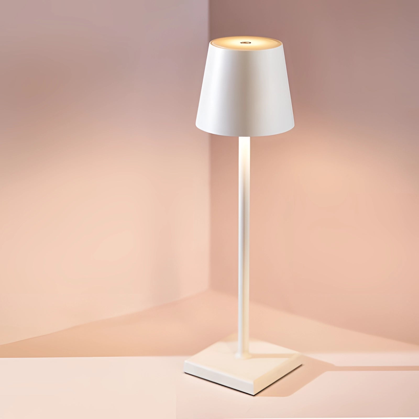 Modern tall white floor lamp with a minimalist design, featuring a wooden base and a sleek white lampshade, ideal for chic living room lighting and interior decor.