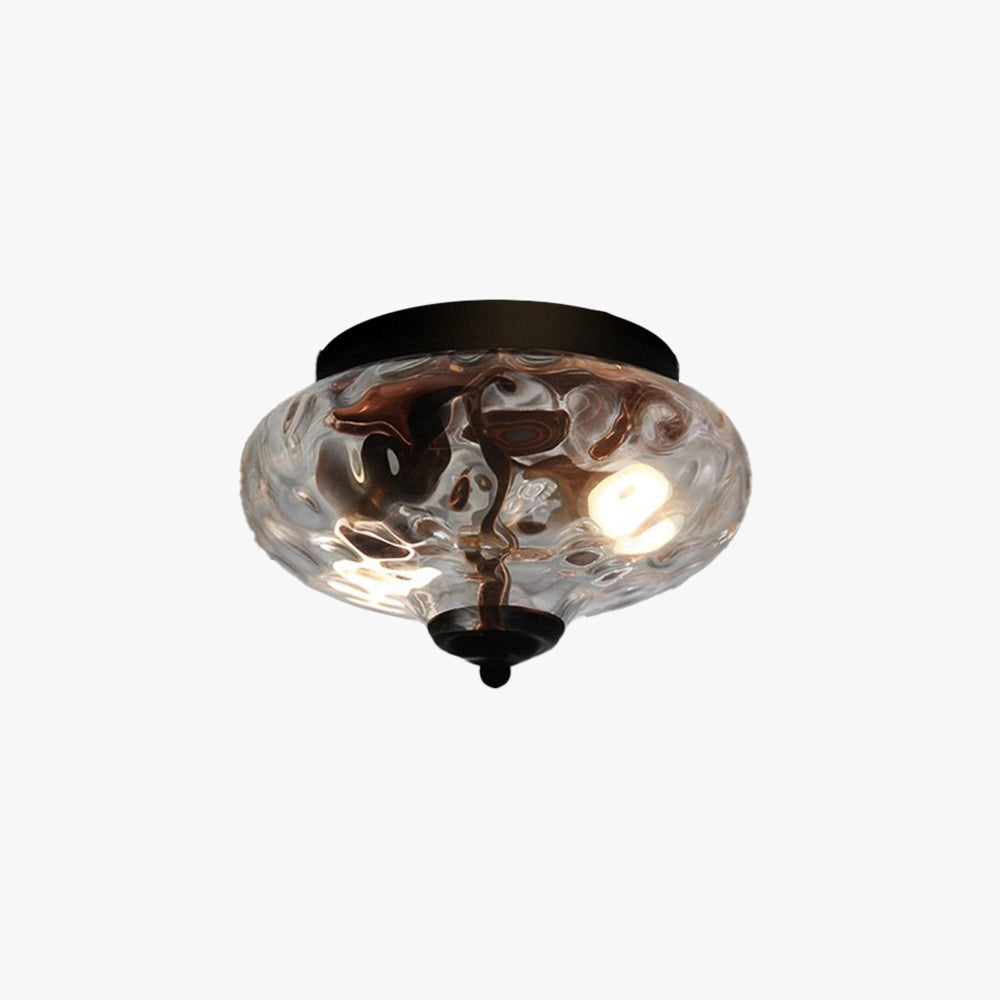Modern textured glass ceiling light fixture with a swirl pattern design, featuring a circular shape and metal accents, ideal for home decor.