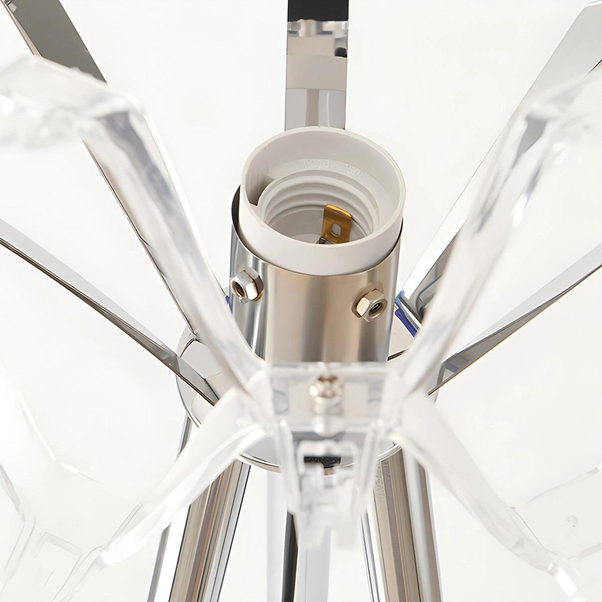 Modern tri-leg floor lamp with a petal design, featuring a clear acrylic globe and white finish.