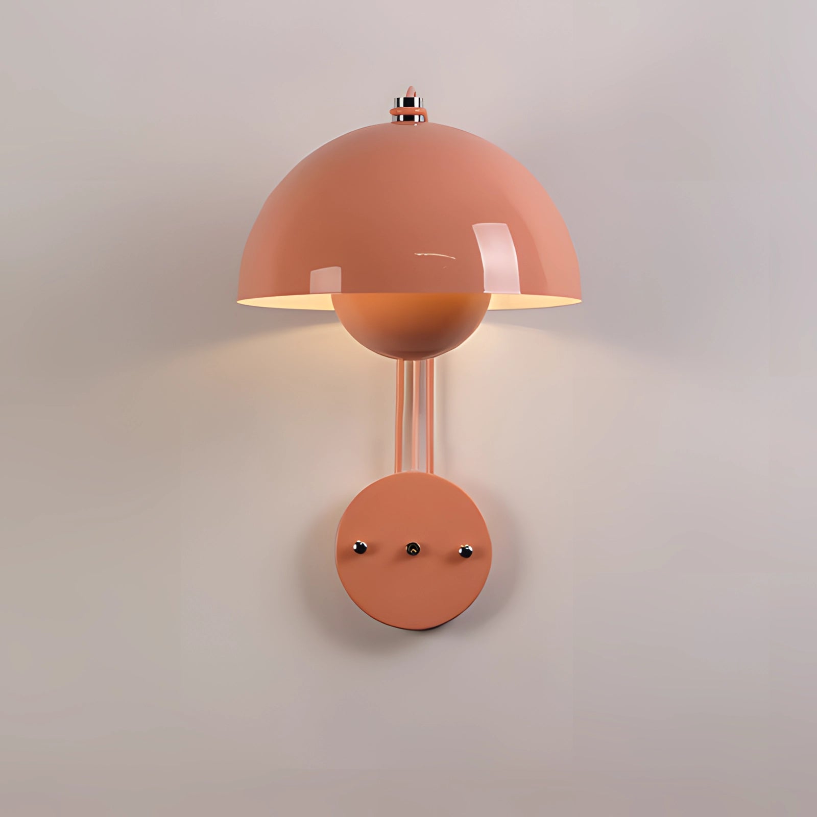Minimalist pink dome wall lamp with a white base, featuring a circular design and wooden accents, suitable for modern interiors as an elegant light fixture.