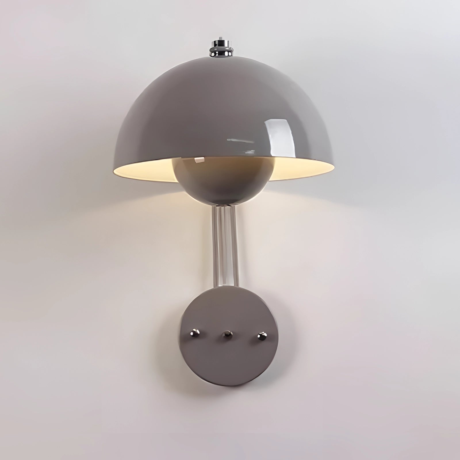 Modern gray dome-shaped wall lamp with a minimalist design, featuring a sleek and contemporary look suitable for various interior styles.
