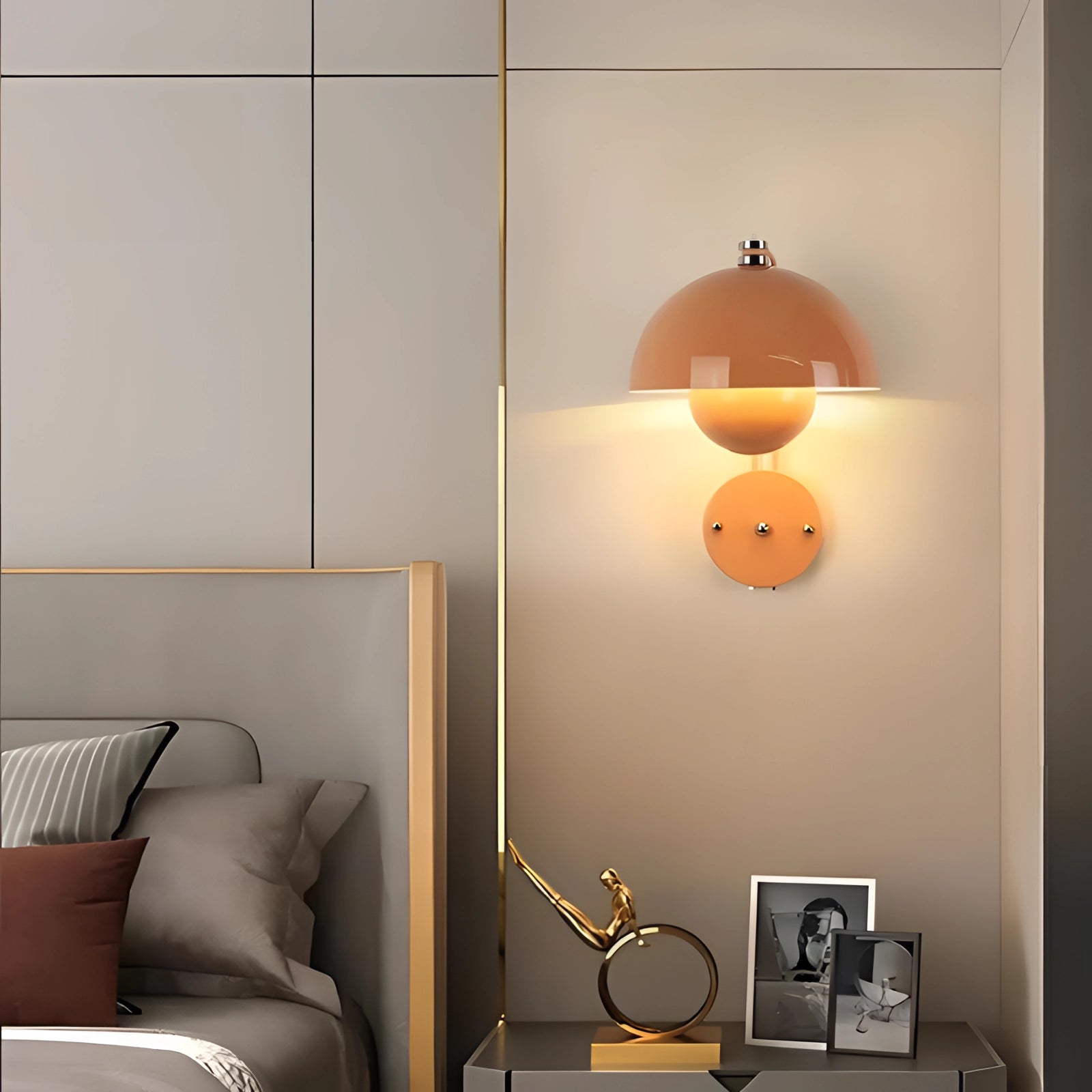Modern white dome wall lamp mounted on a wooden wall, casting a warm orange glow, enhancing the minimalist and contemporary interior design.