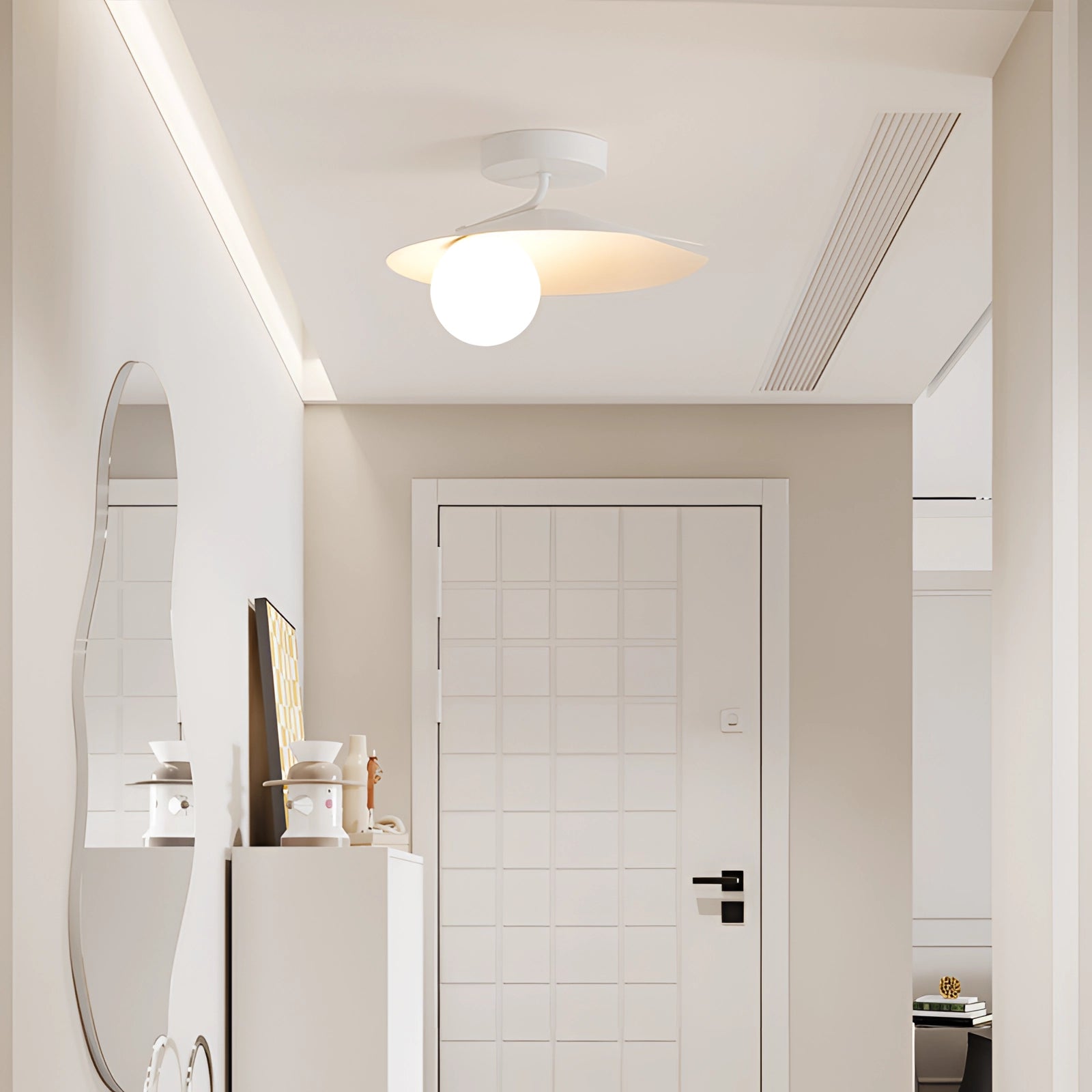 Modern white flush mount ceiling light with a minimalist matte finish, featuring a sleek design suitable for contemporary interiors. The light is mounted on a wooden ceiling, highlighting its compatibility with various interior design elements, including hardwood flooring and glass decor accents. The dimensions are 11.8x7.1 inches.