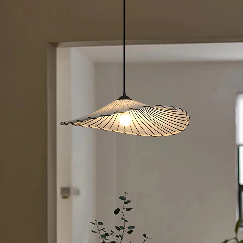 Modern wooden pendant lamp with a sculptural design featuring a 15.7-inch shade, crafted from natural wood elements, hanging from the ceiling in a contemporary interior setting.