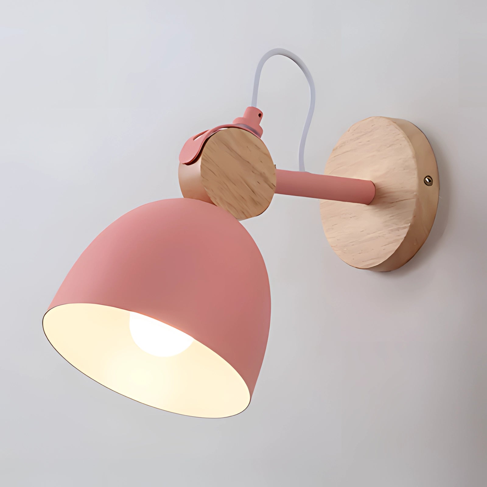 Sleek white Nordic LED wall lamp in a Scandinavian design with an adjustable structure, featuring a pink finish and metal accents.