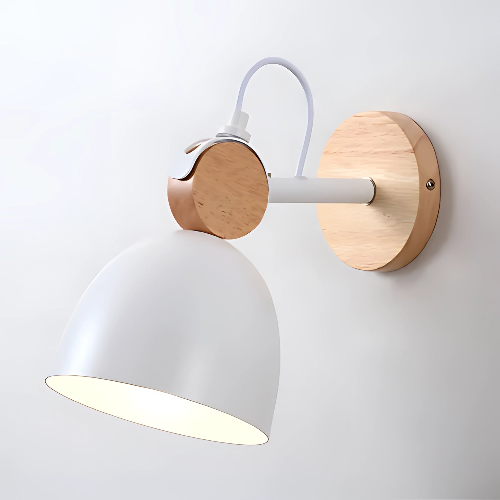Sleek white Nordic LED wall lamp with Scandinavian design, featuring an adjustable circular shape, combining wood and metal materials.
