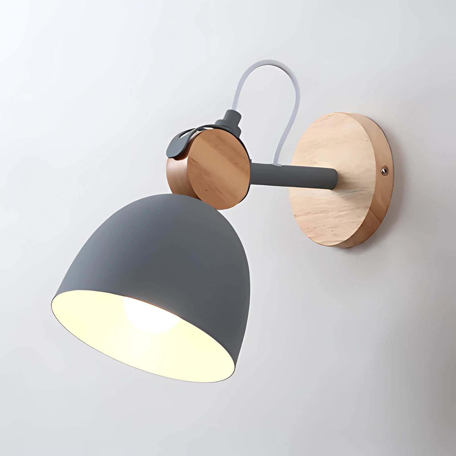 Nordic LED Wall Lamp in Gray with Scandinavian design featuring a sleek, adjustable structure and circular shape, mounted on a wall with a minimalist and modern aesthetic.