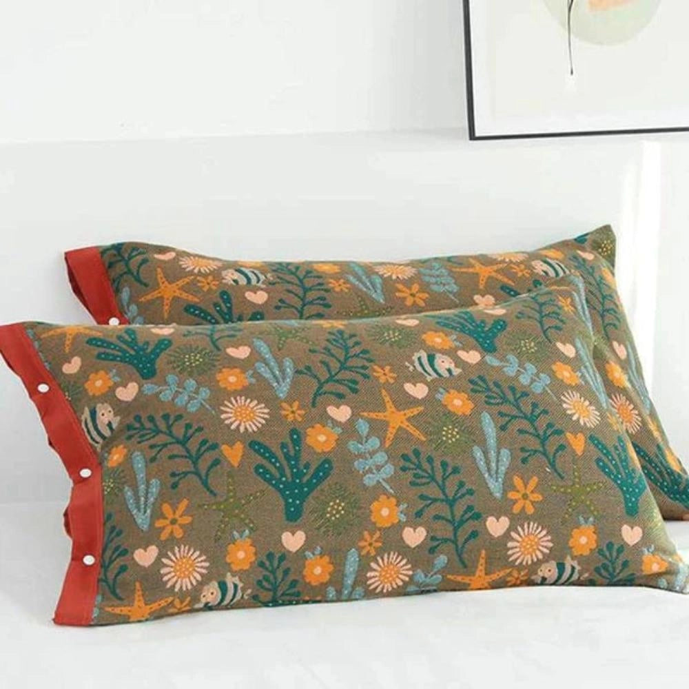 Ocean-themed throw pillow featuring a brown design with fish and coral patterns, sized 52cmx80cm.