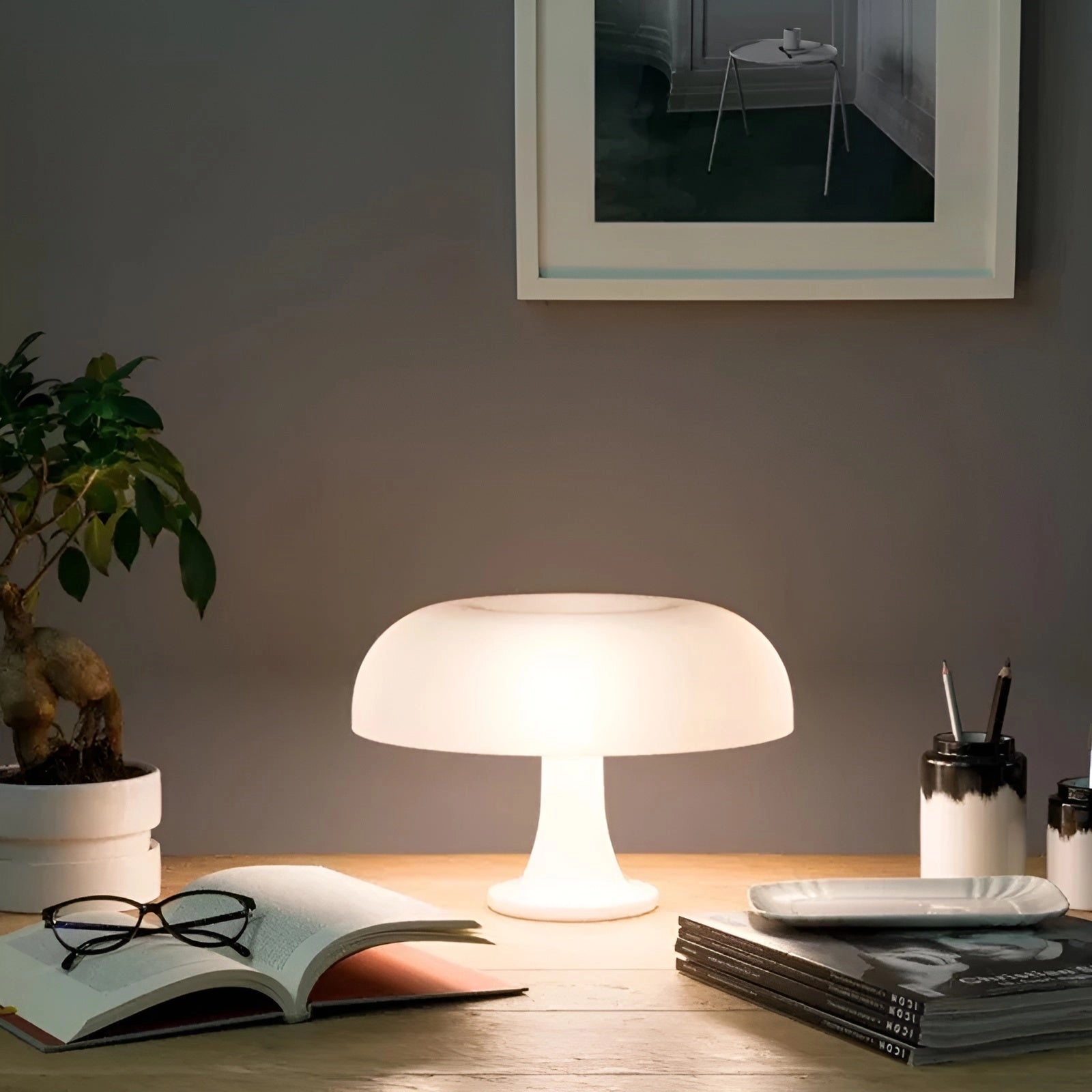 Orange Mushroom Lamp in Retro 70s Style, featuring a mid-century design placed on a table. The lamp emits warm light and enhances interior design, creating a cozy ambiance.