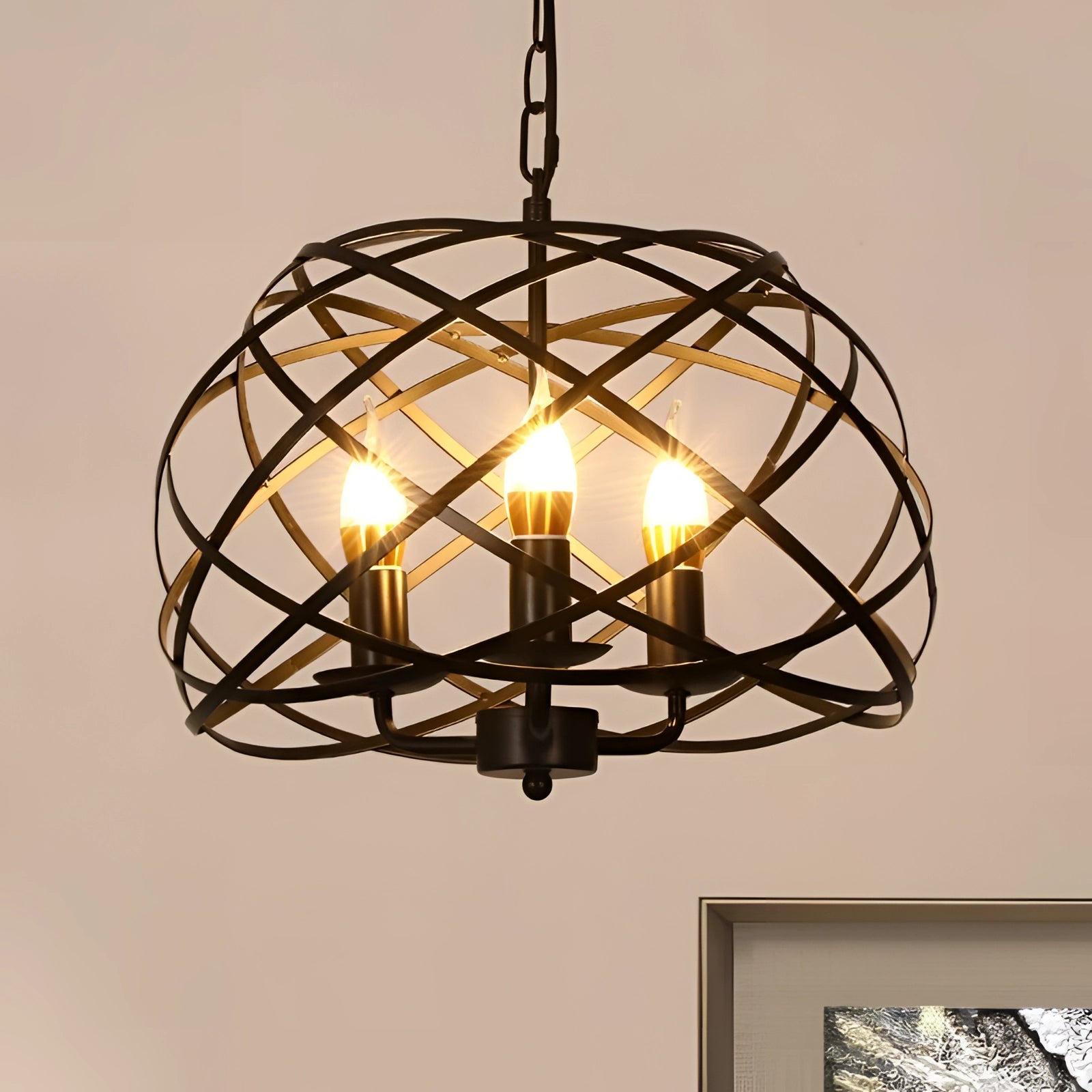 Black metal cage orb chandelier with an industrial design, featuring warm amber lighting and suspended as a pendant light.