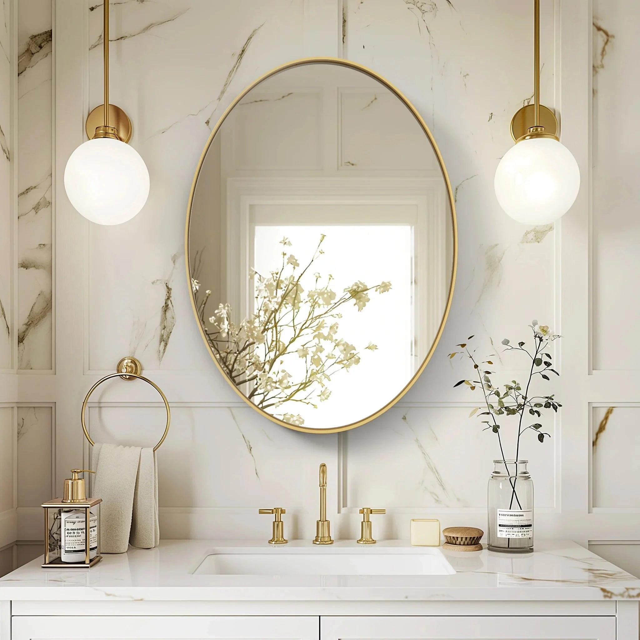 Oval Gold Bathroom Mirror with White Marble Countertop Decor