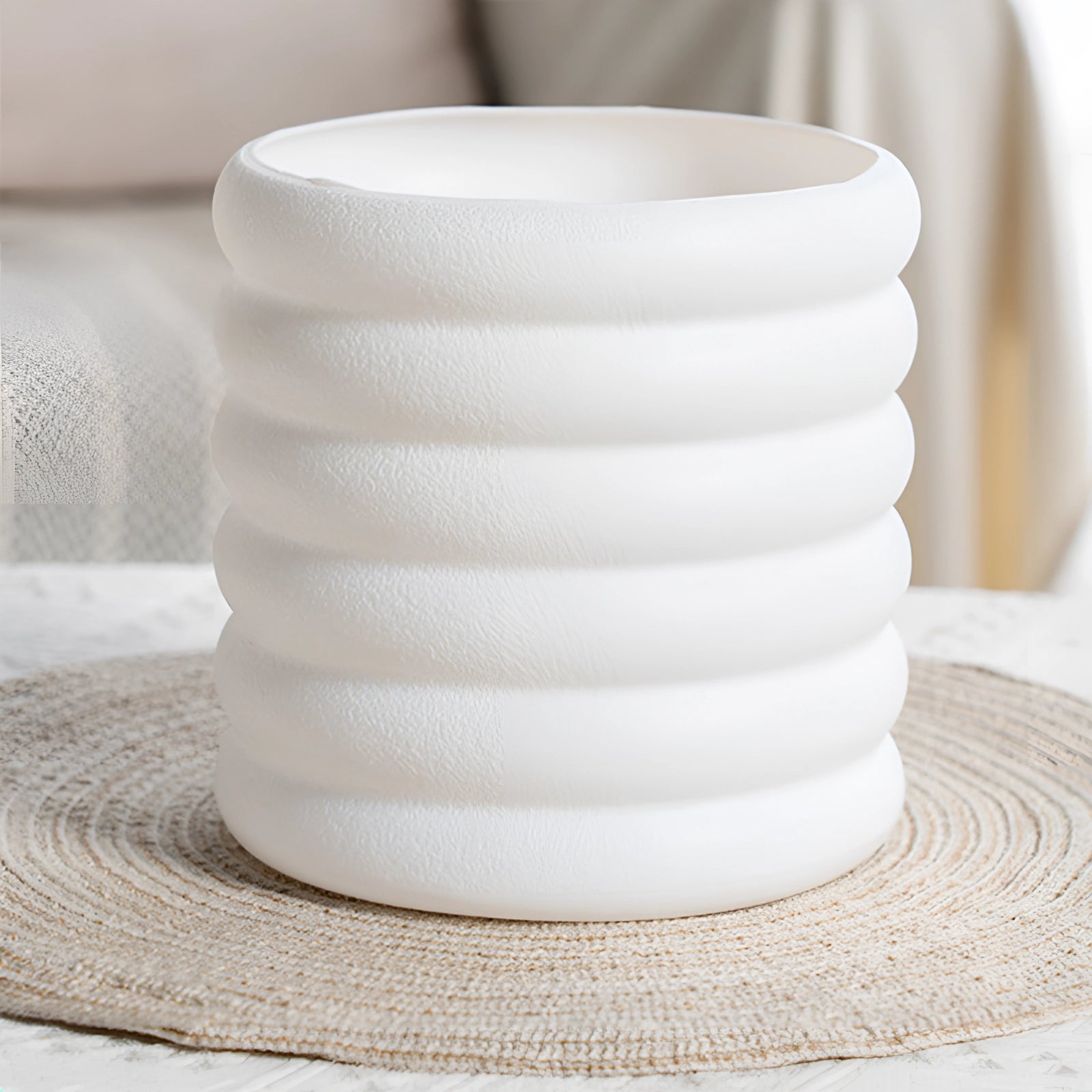 Peace lily plant in a white ceramic planter, suitable for indoor air purification and home decor.