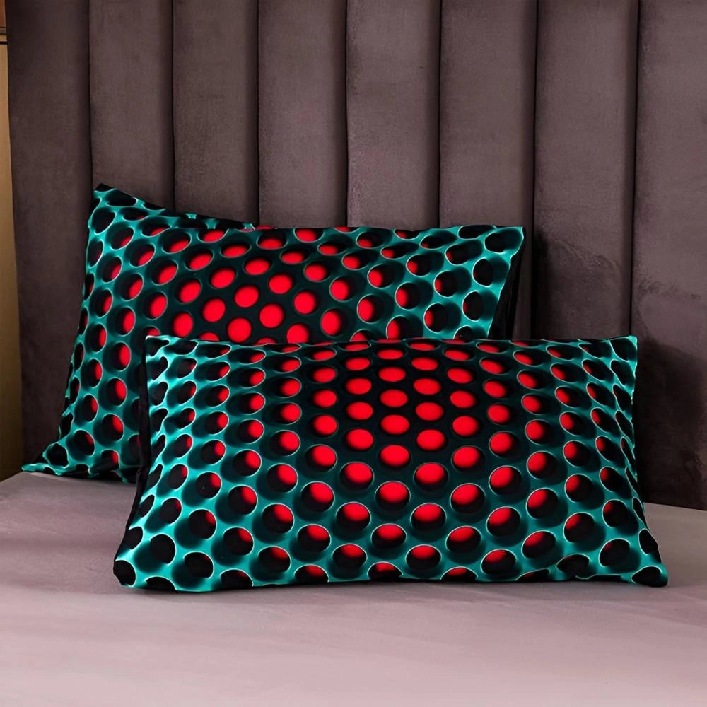 Red and black polka dot bedding set displayed on a bed, featuring a modern design with a quilt cover and matching pillows.
