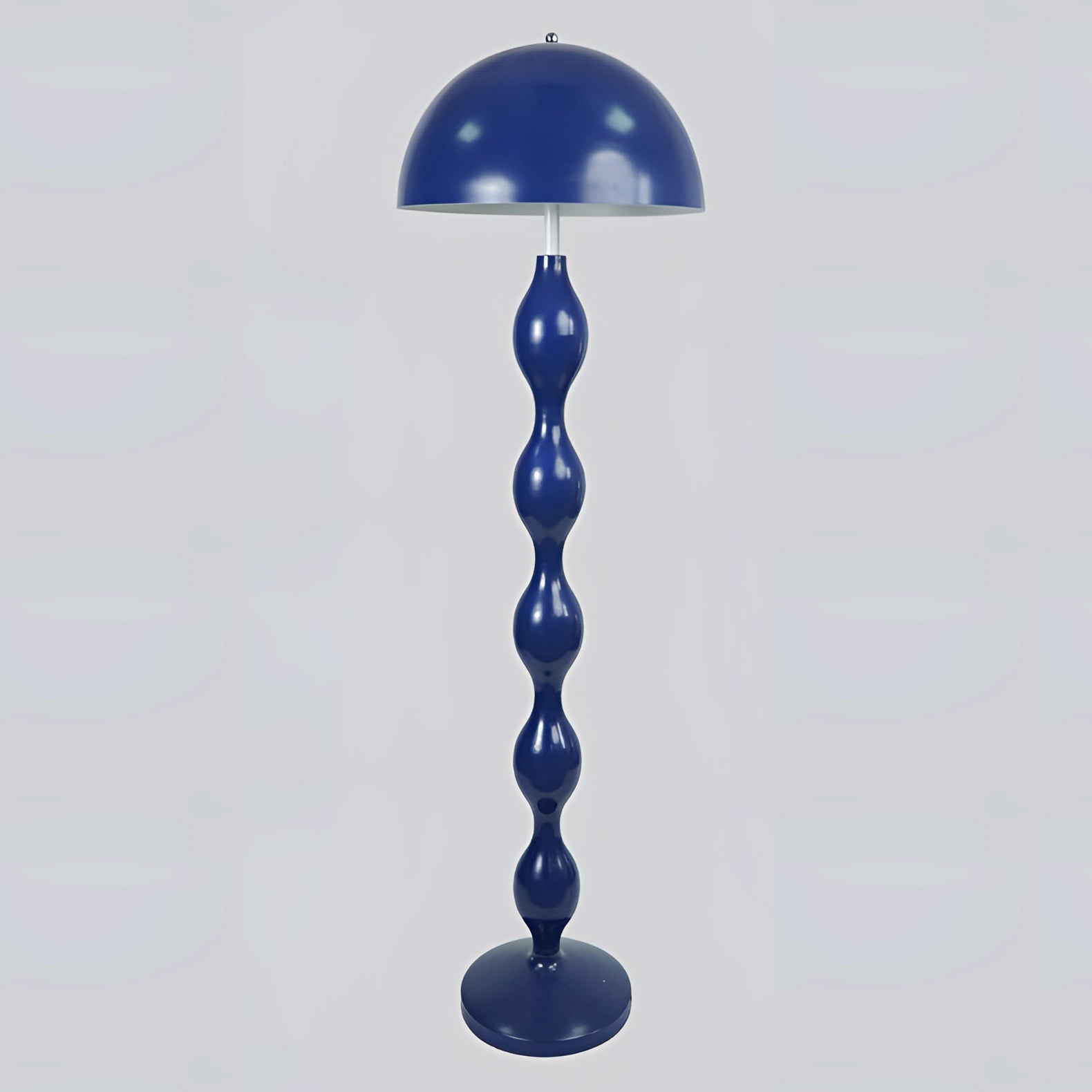 Modern red floor lamp with wavy design and contemporary sculptural lighting, featuring a symmetrical and artistic aesthetic.