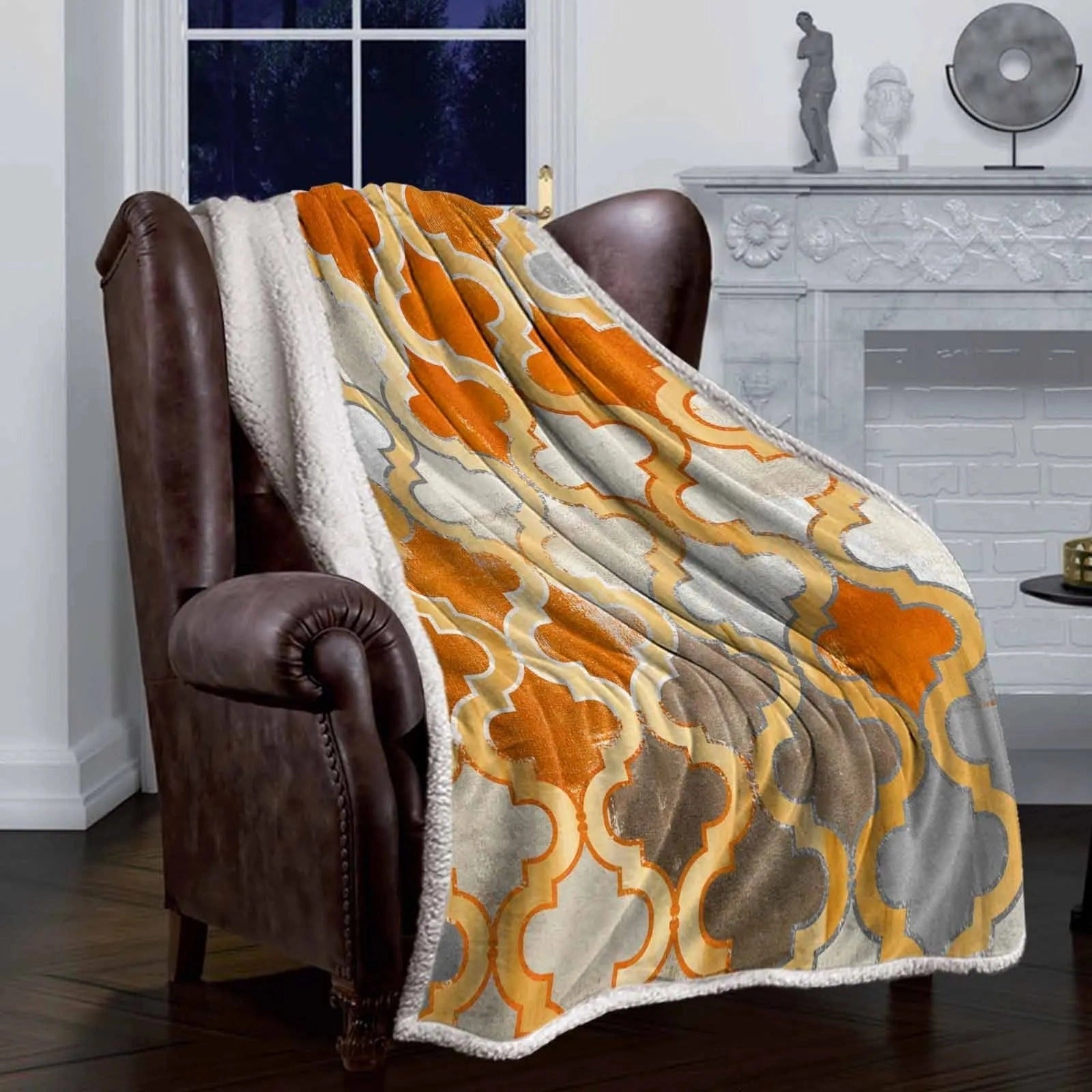 A cozy Retro Moroccan Orange Cashmere Blanket draped over a wooden floor, with natural light streaming in from a nearby window. The blanket's vibrant orange hue adds warmth and style to the interior decor, making it a perfect winter throw.